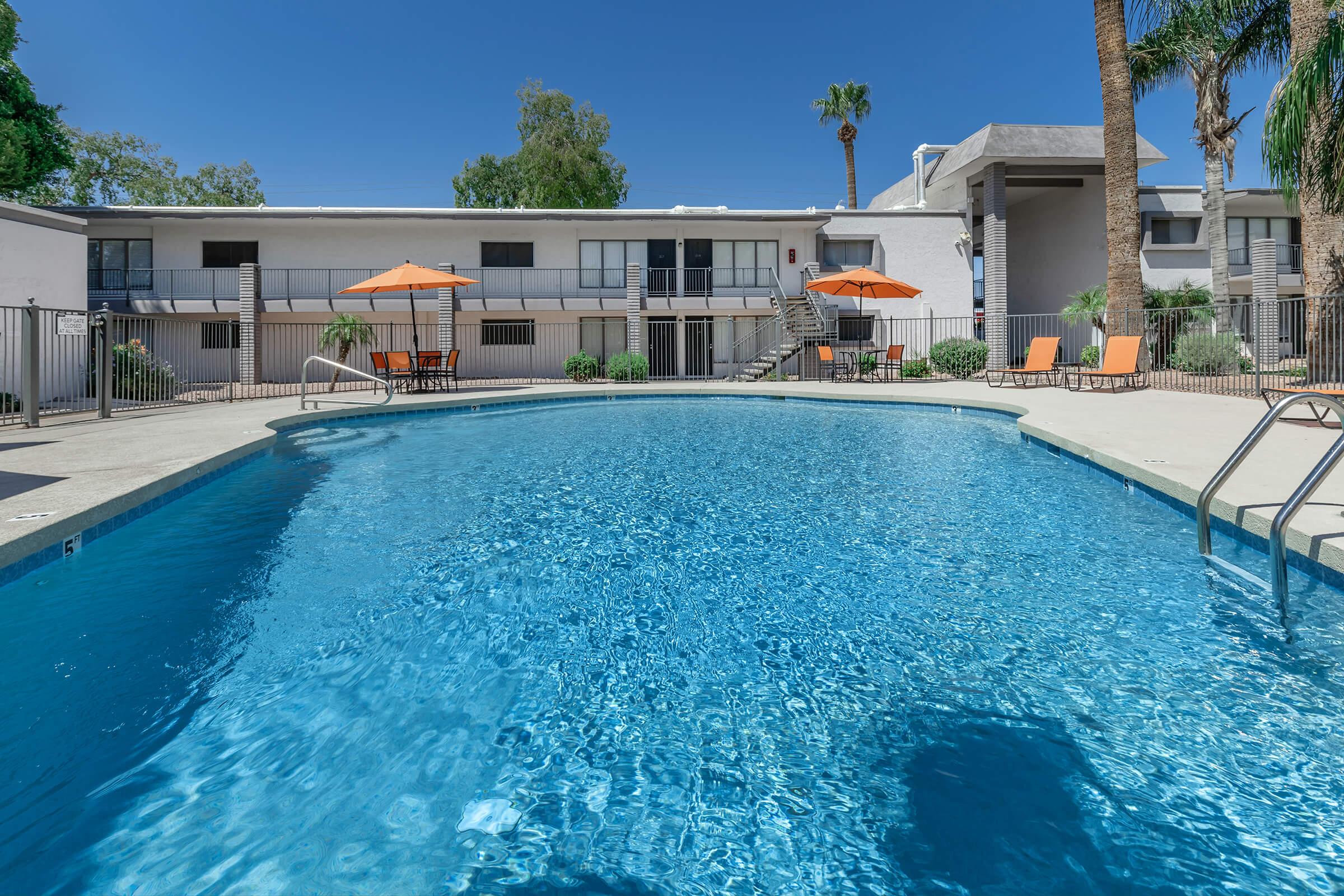 a house with a large pool of water