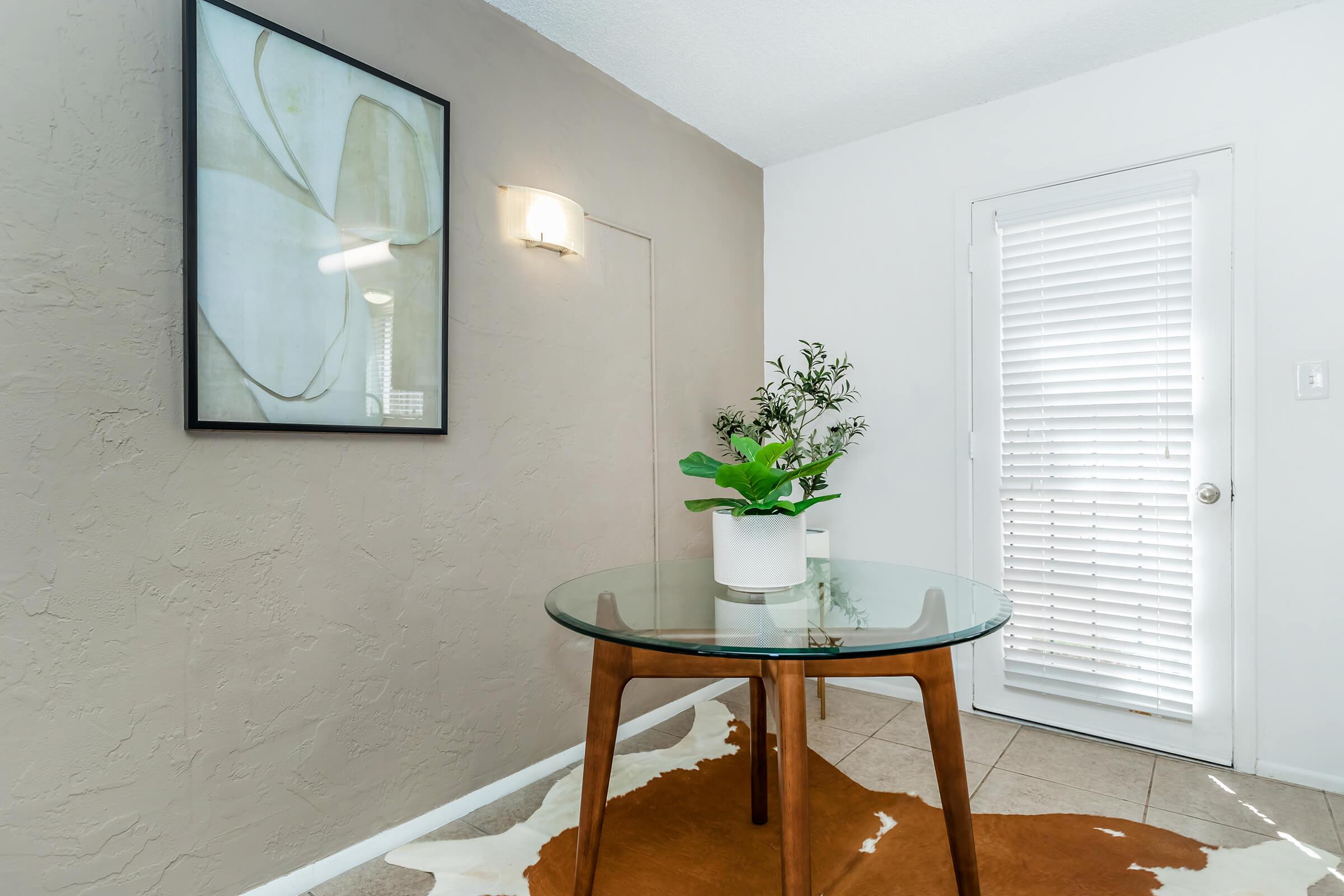 a room filled with furniture and a large window