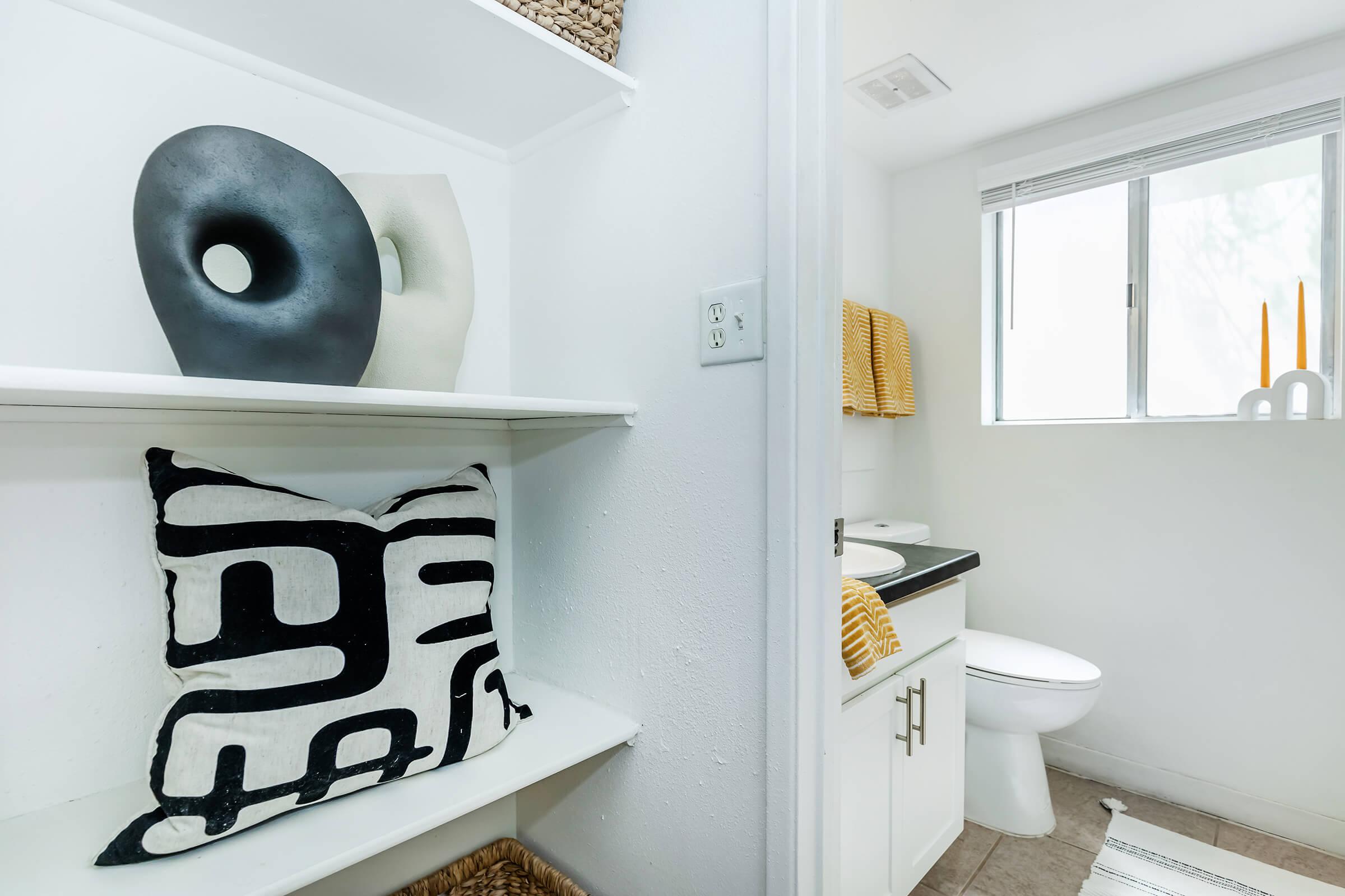 a close up of a sink and a mirror