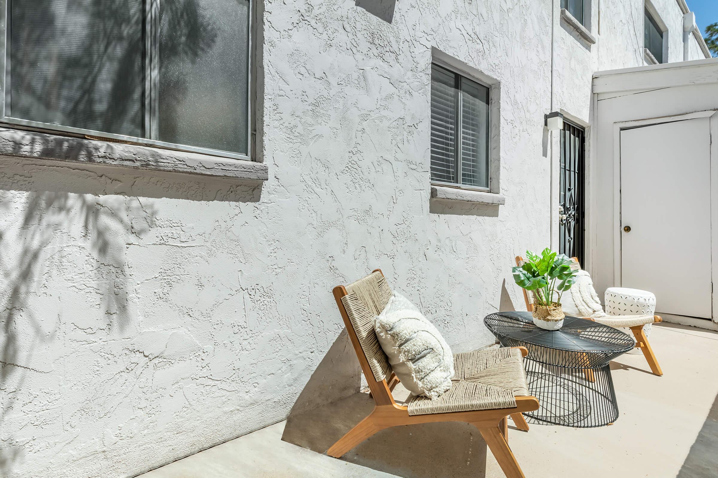 a cat sitting on top of a building