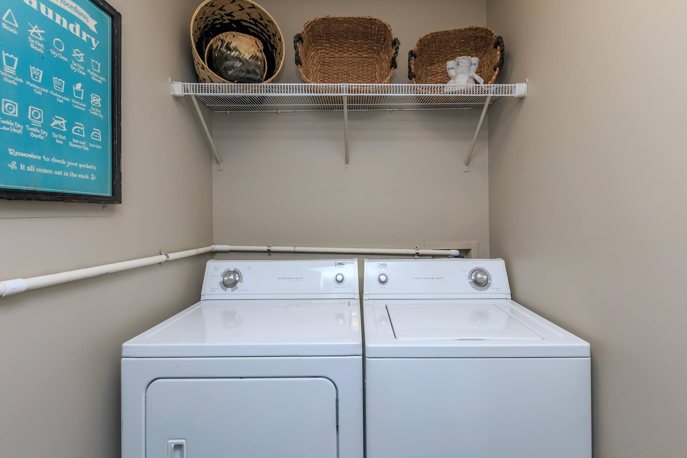 a white refrigerator freezer sitting inside of a kitchen
