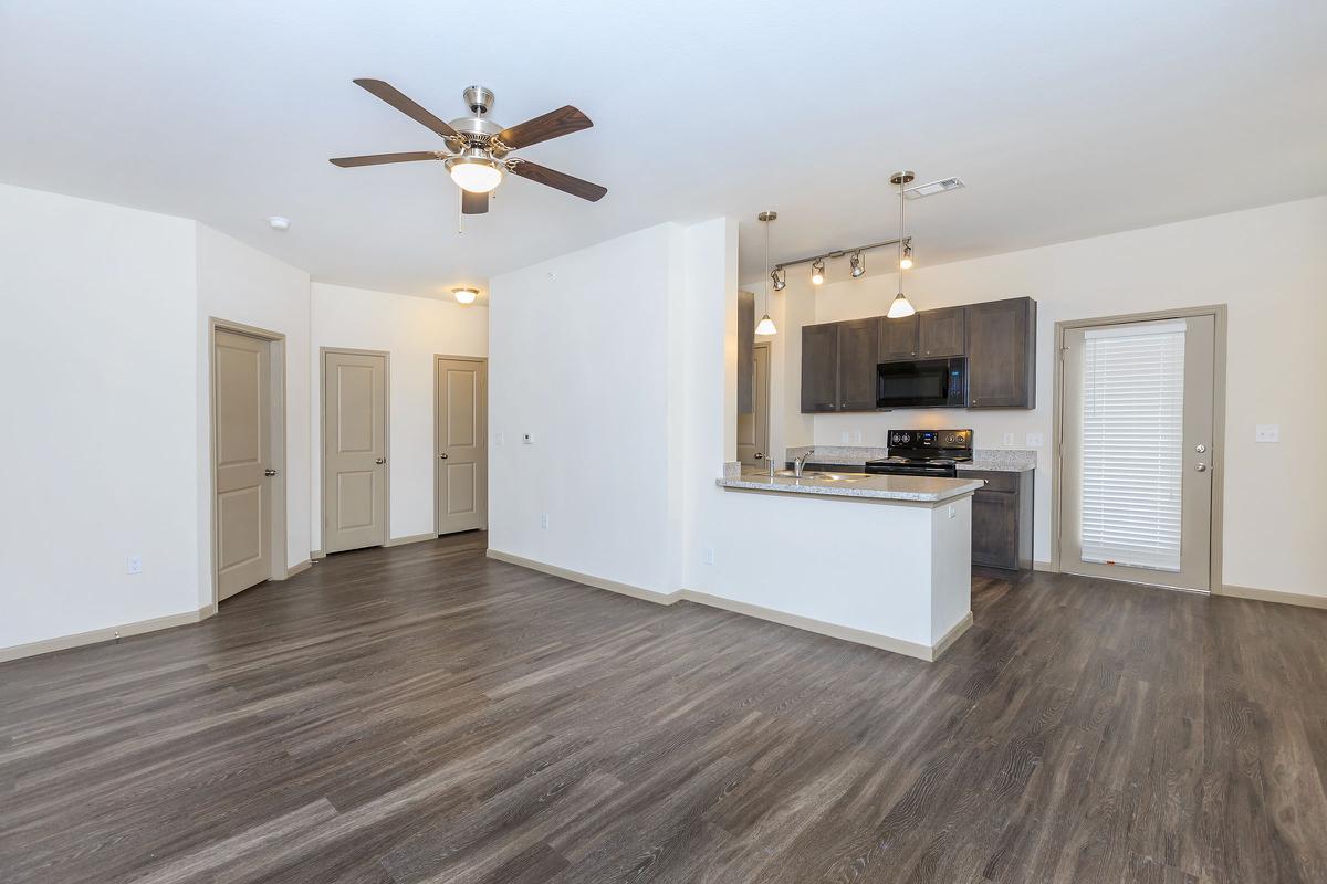 a kitchen with a wood floor