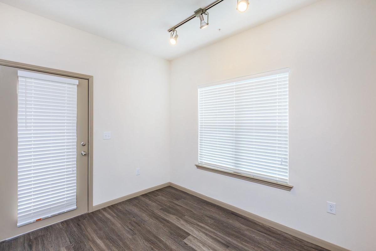 a room with a sink and a window