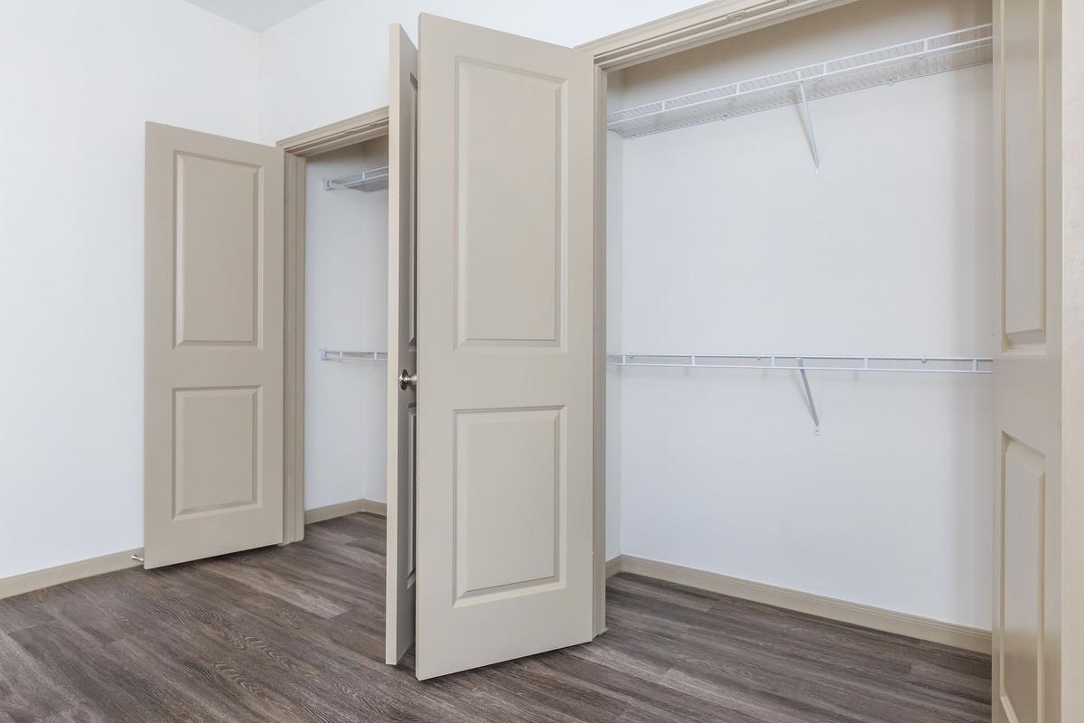 a white refrigerator freezer sitting inside of a building