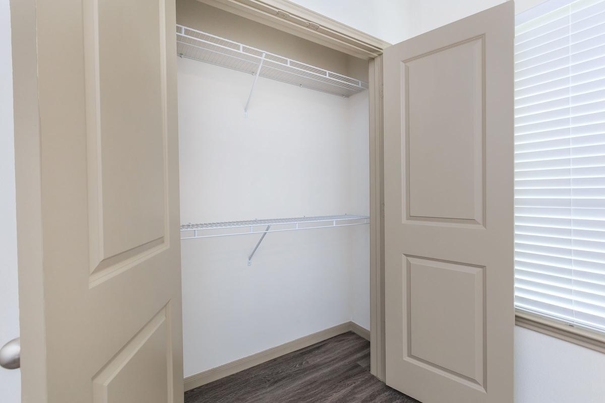 a white refrigerator freezer sitting next to a window