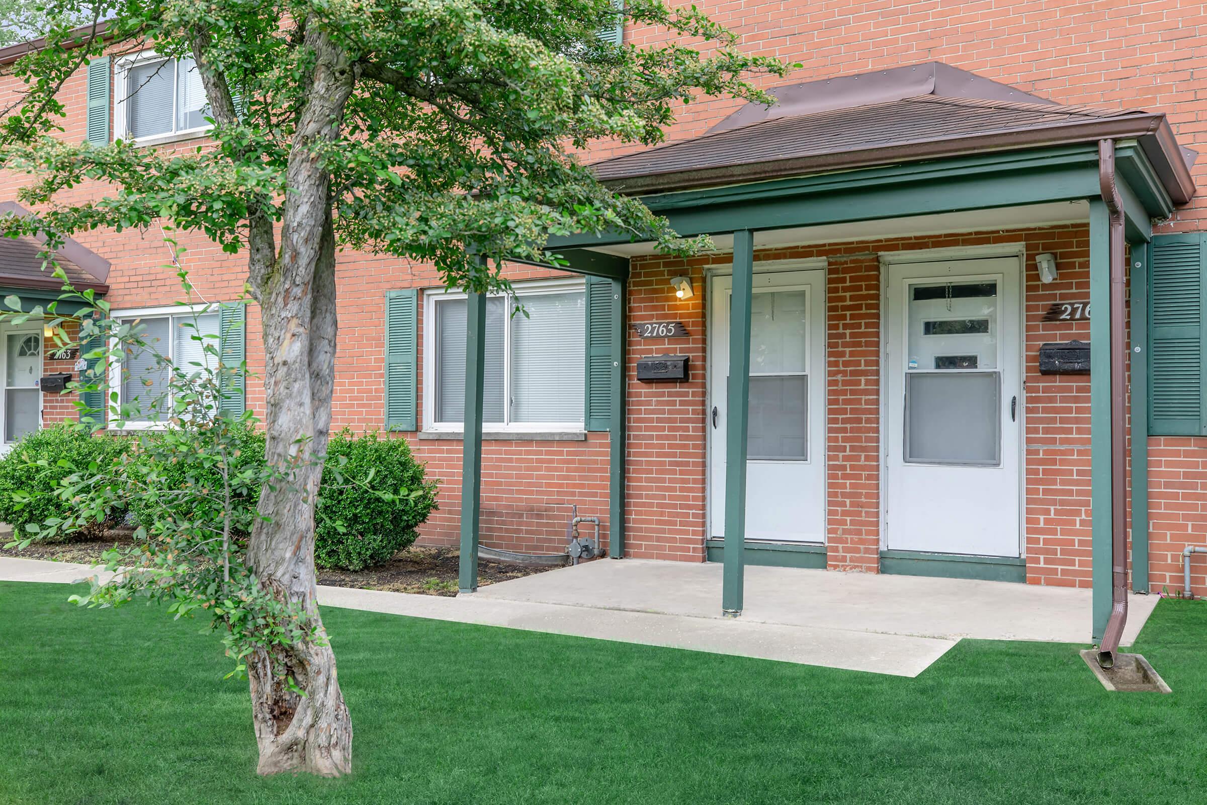 a large lawn in front of a house