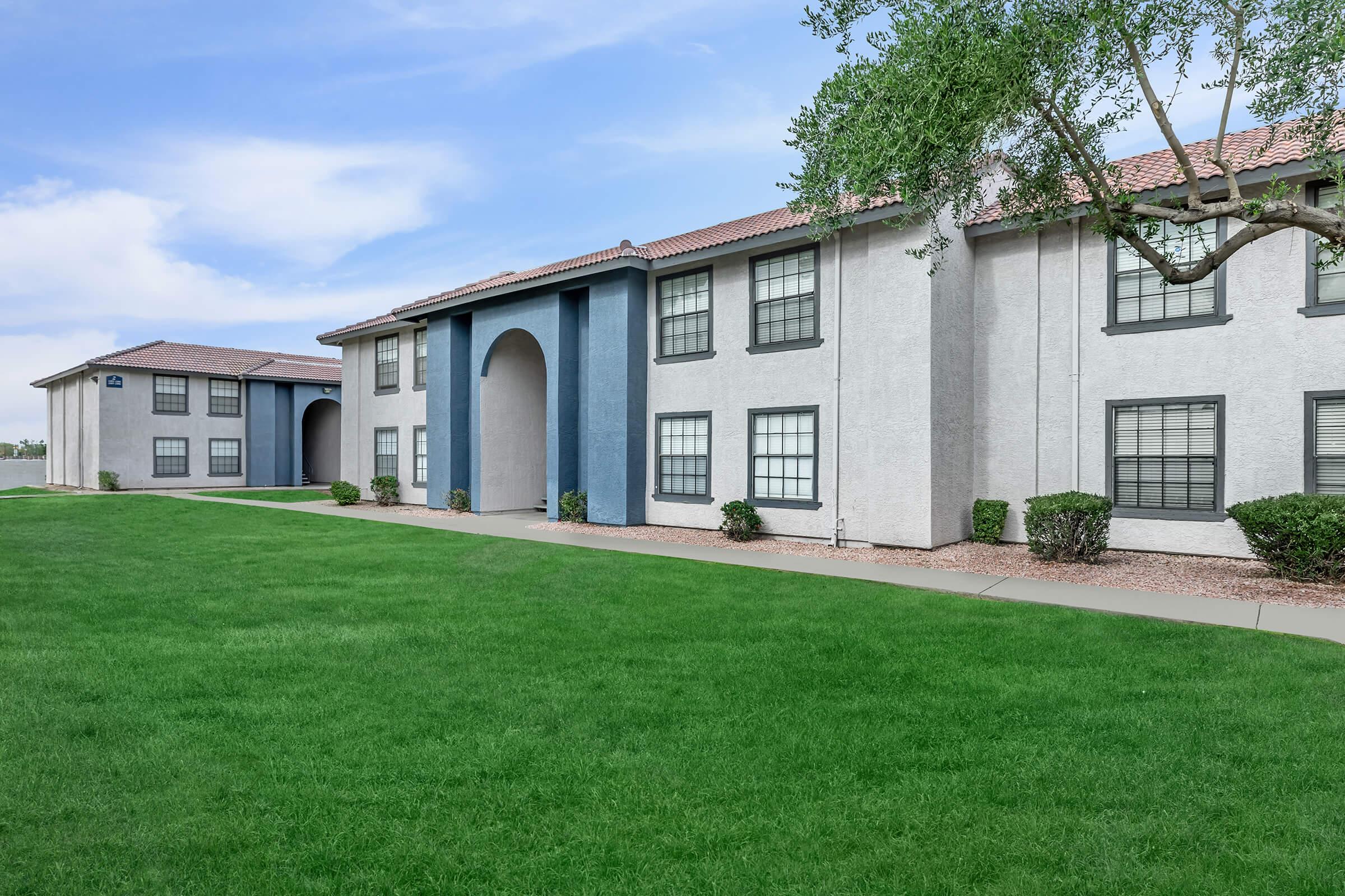 a large lawn in front of a house