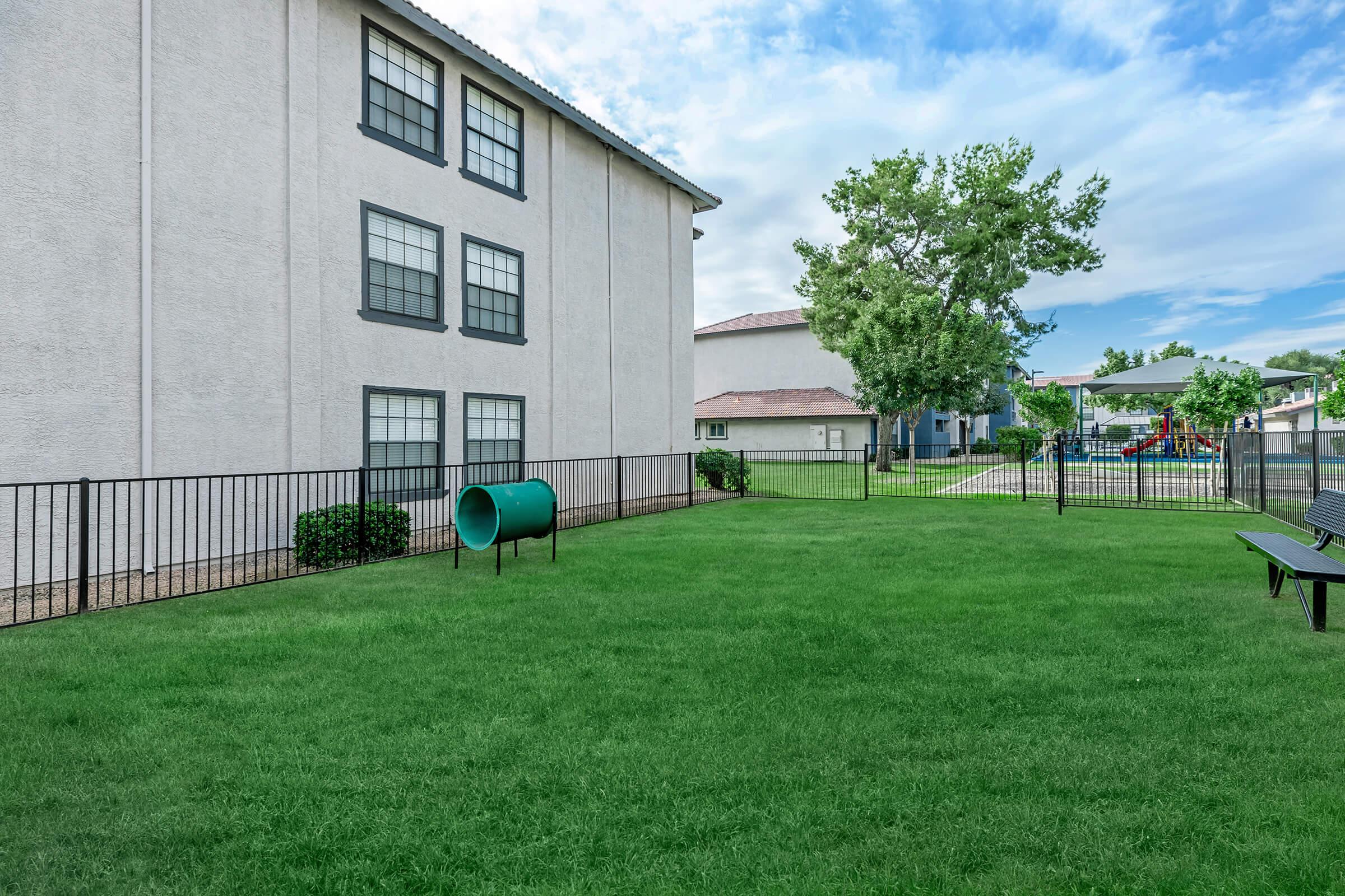 a large lawn in front of a house