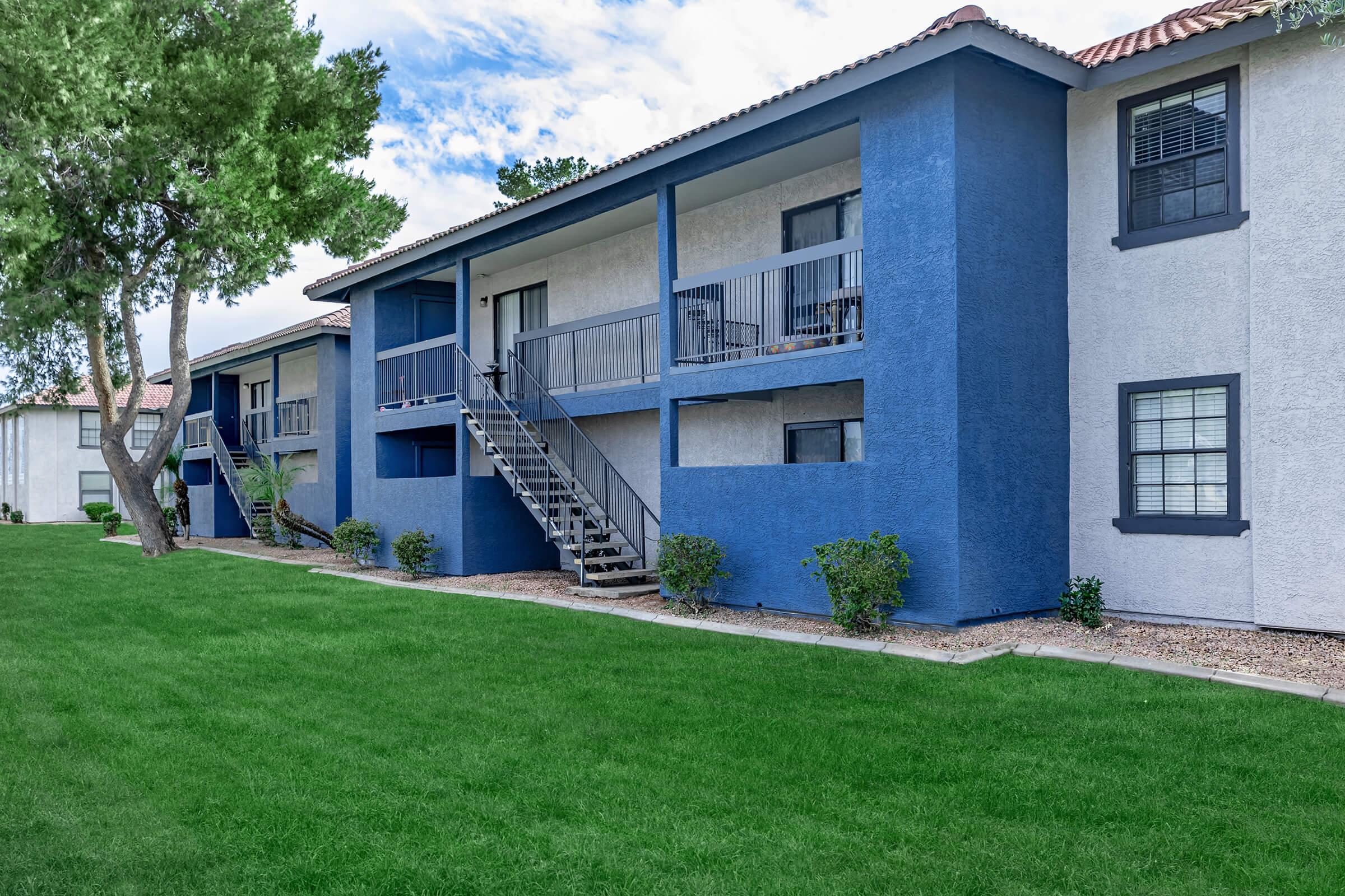 a large lawn in front of a house