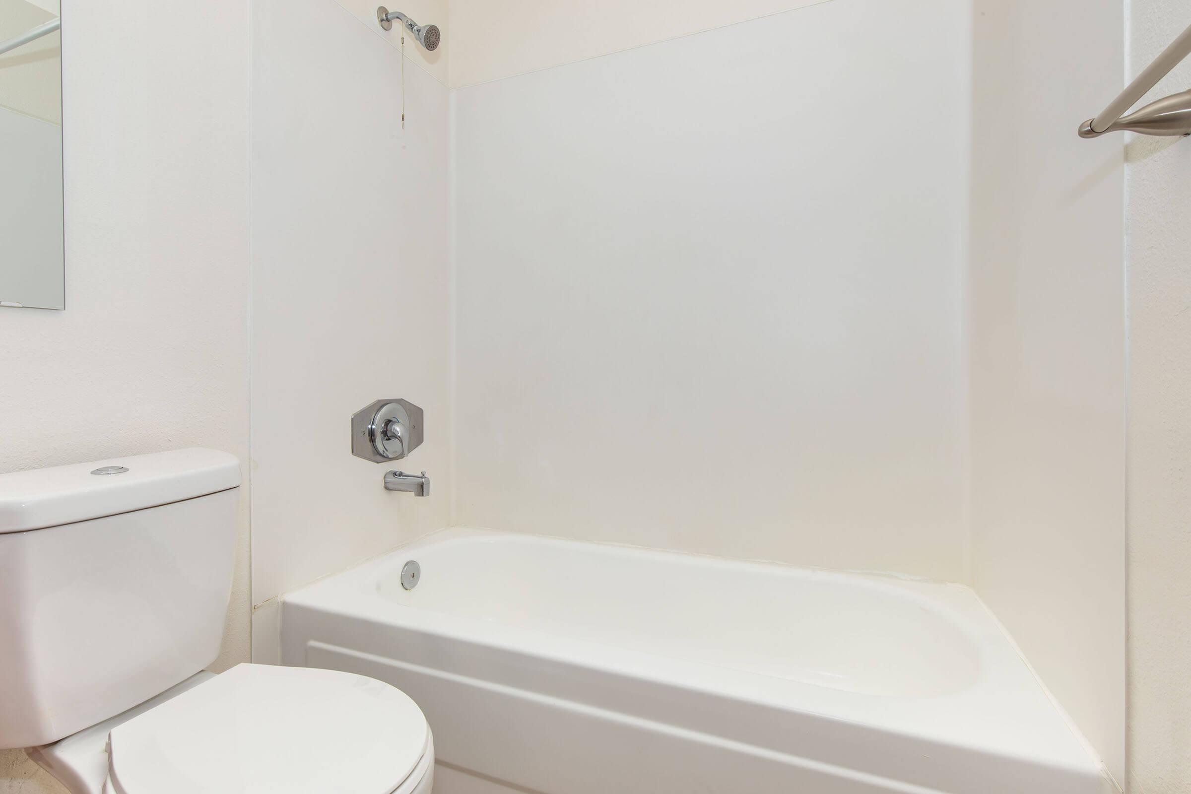 a close up of a sink and a bath tub