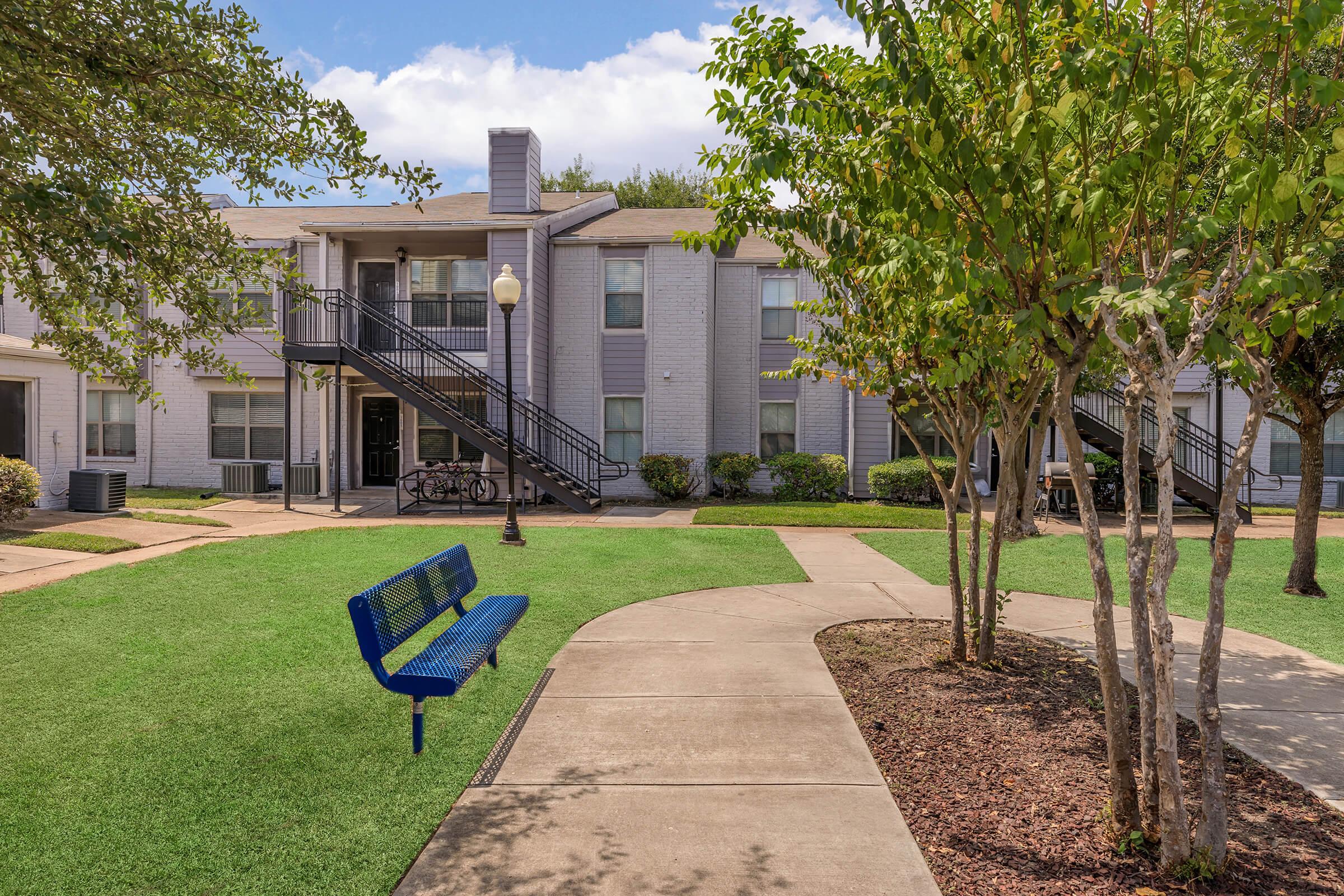 a large lawn in front of a building