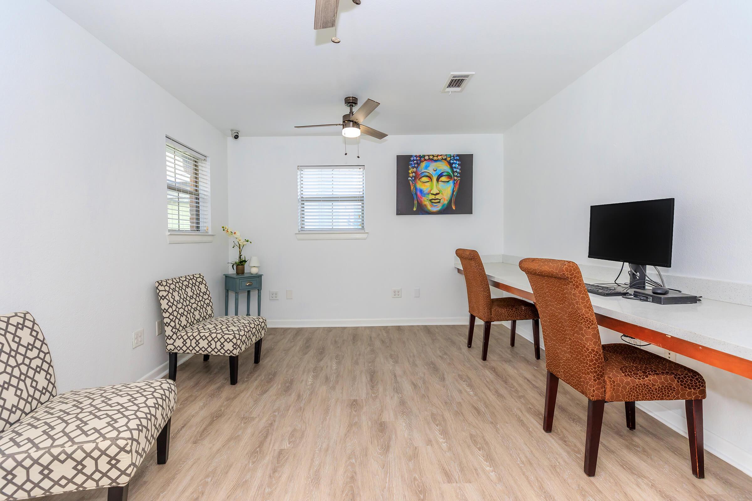 a living room with a wooden floor