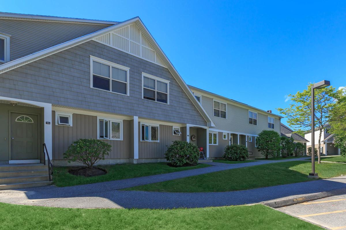 a large lawn in front of a house