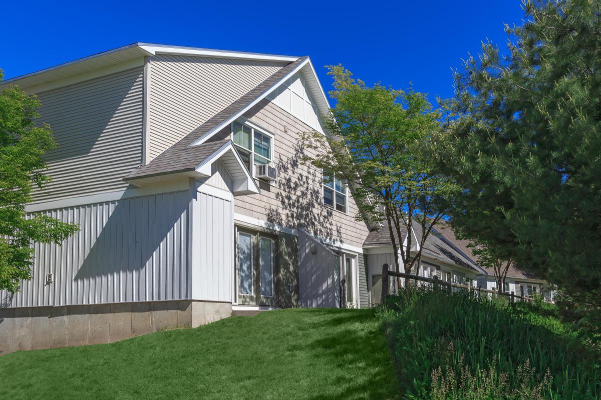 a house with trees in the background