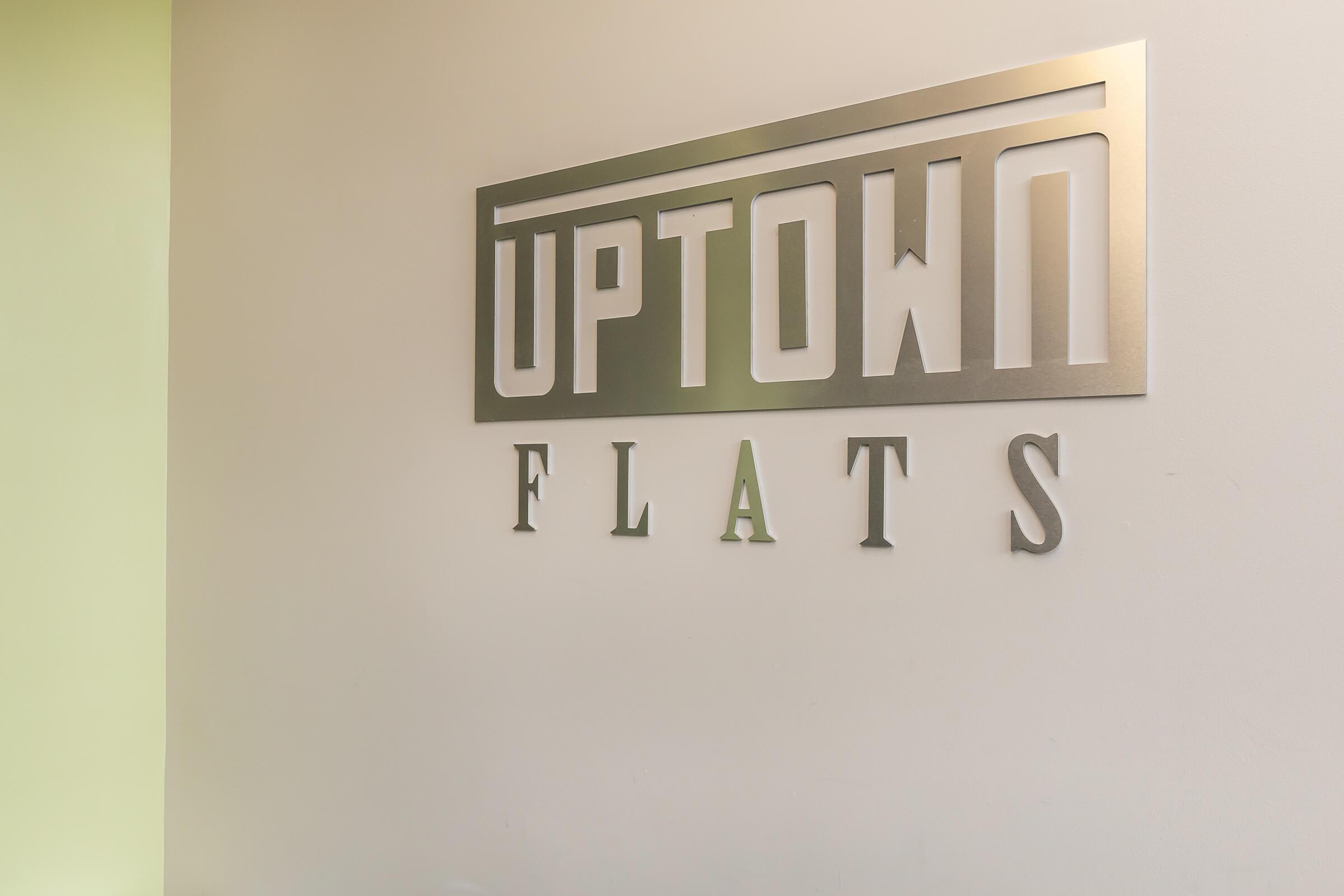 Uptown Flats Logo