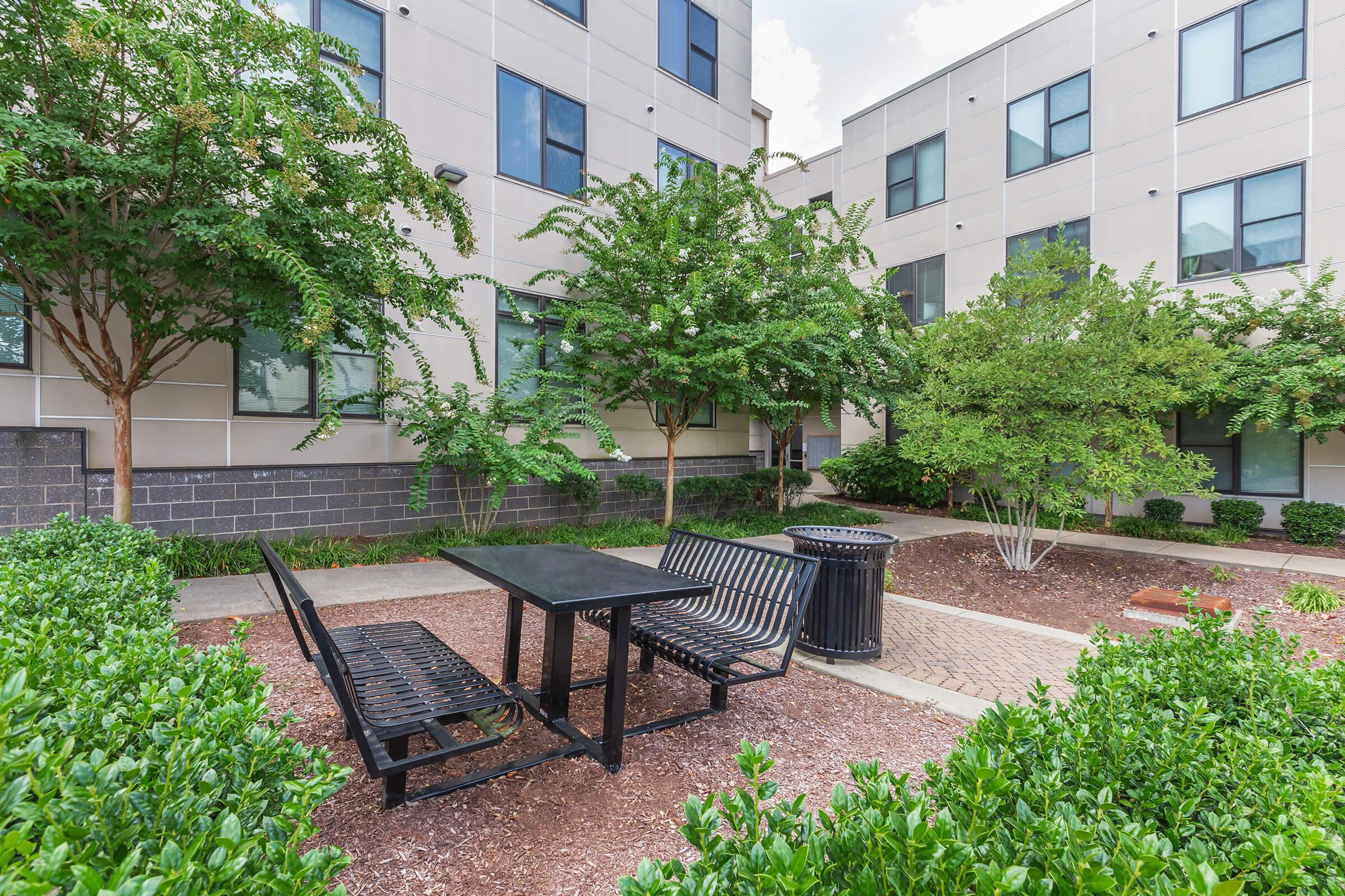 immaculate courtyard with seating