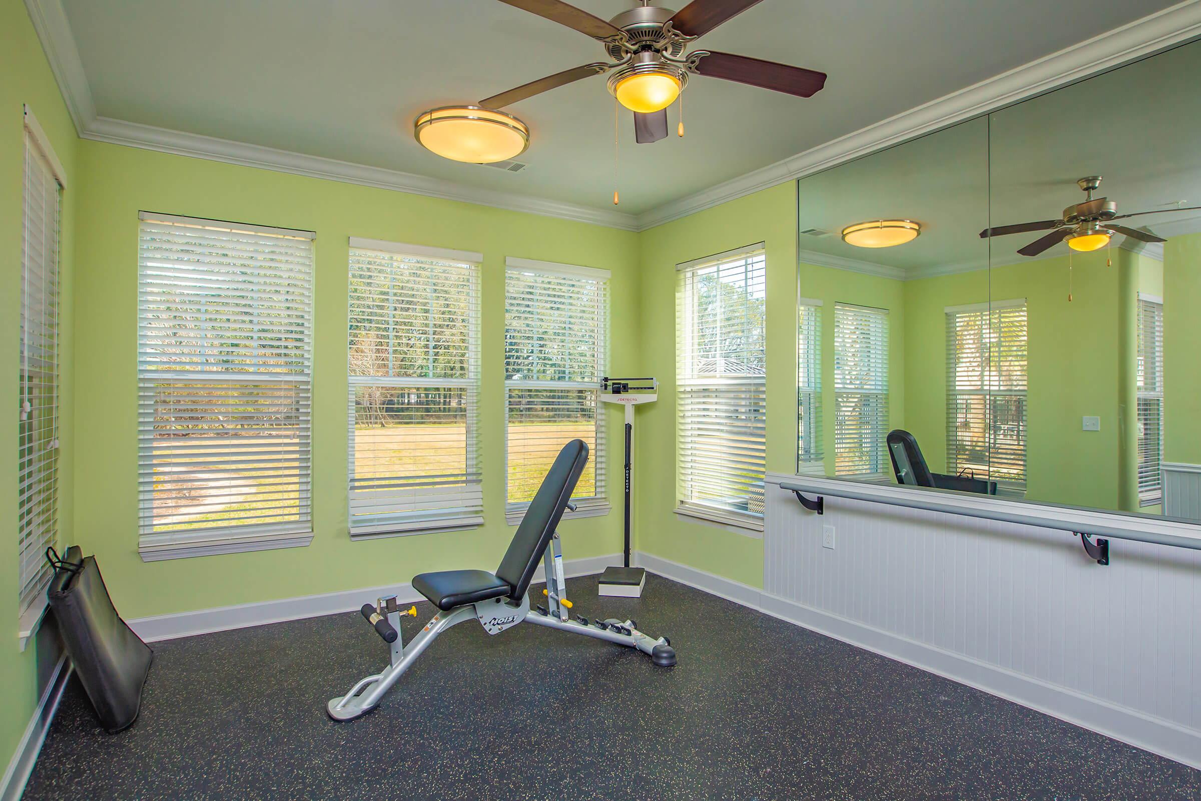 a room filled with furniture and a large window