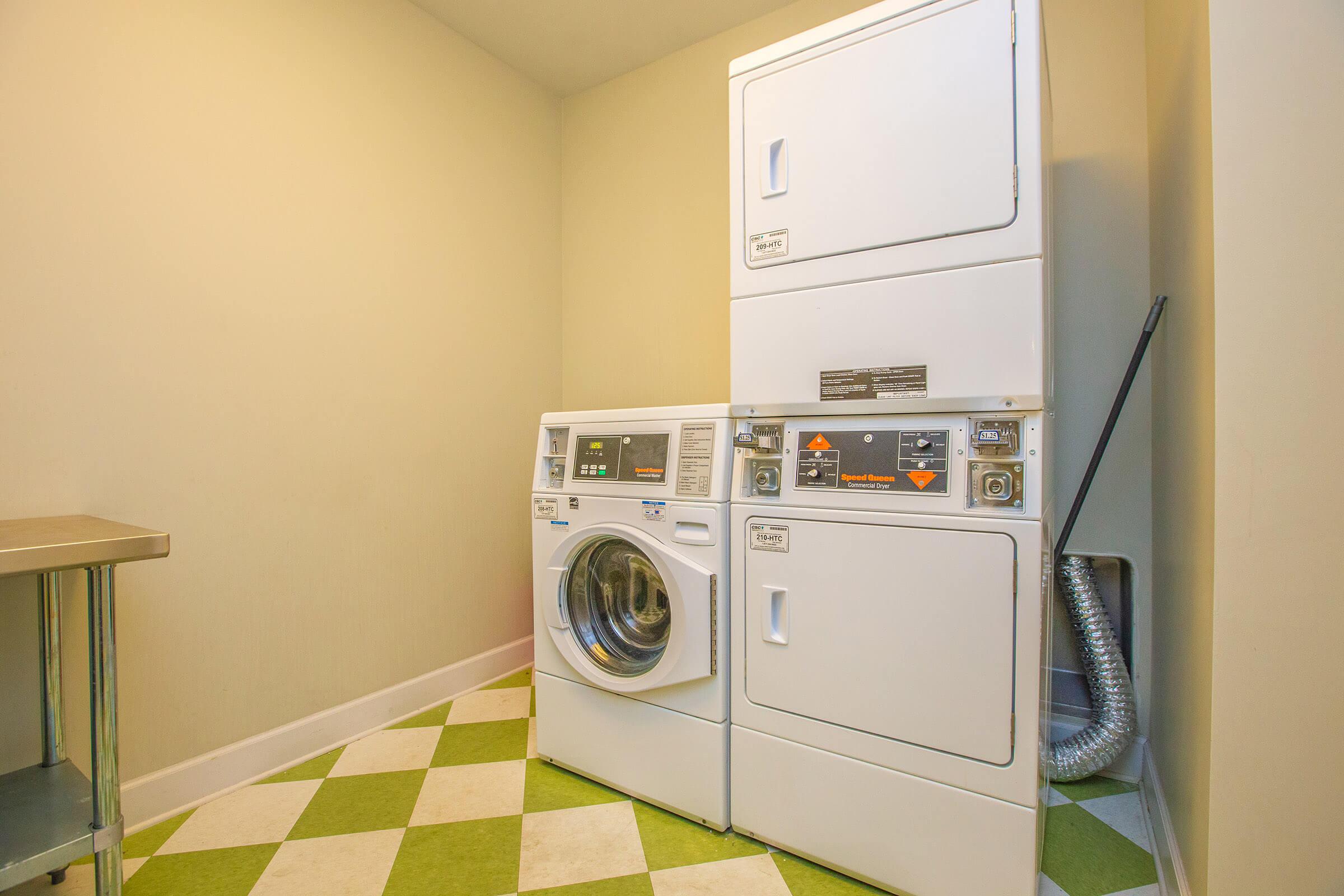 a microwave oven sitting on top of a refrigerator