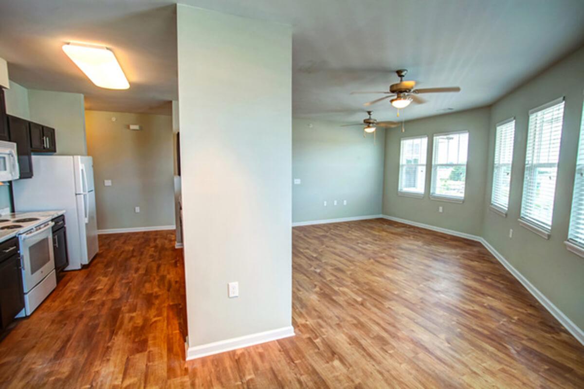 a view of a living room with a hard wood floor