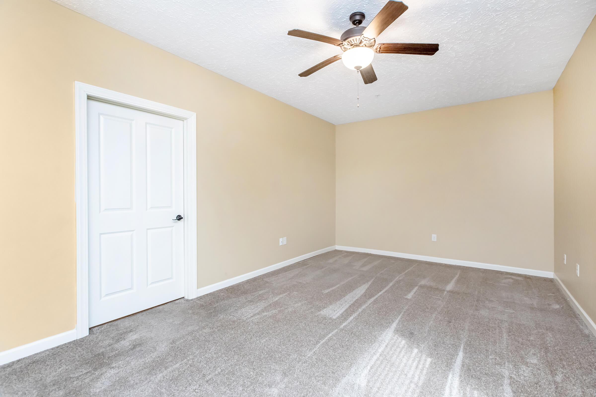 Ceiling fan and bedroom area at Stonewater Place Apartments