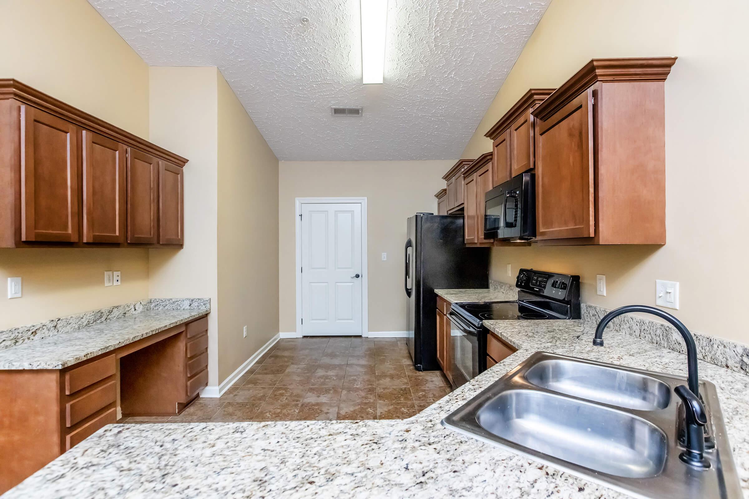 Kitchen interior and pantry at Stonewater Place Apartments