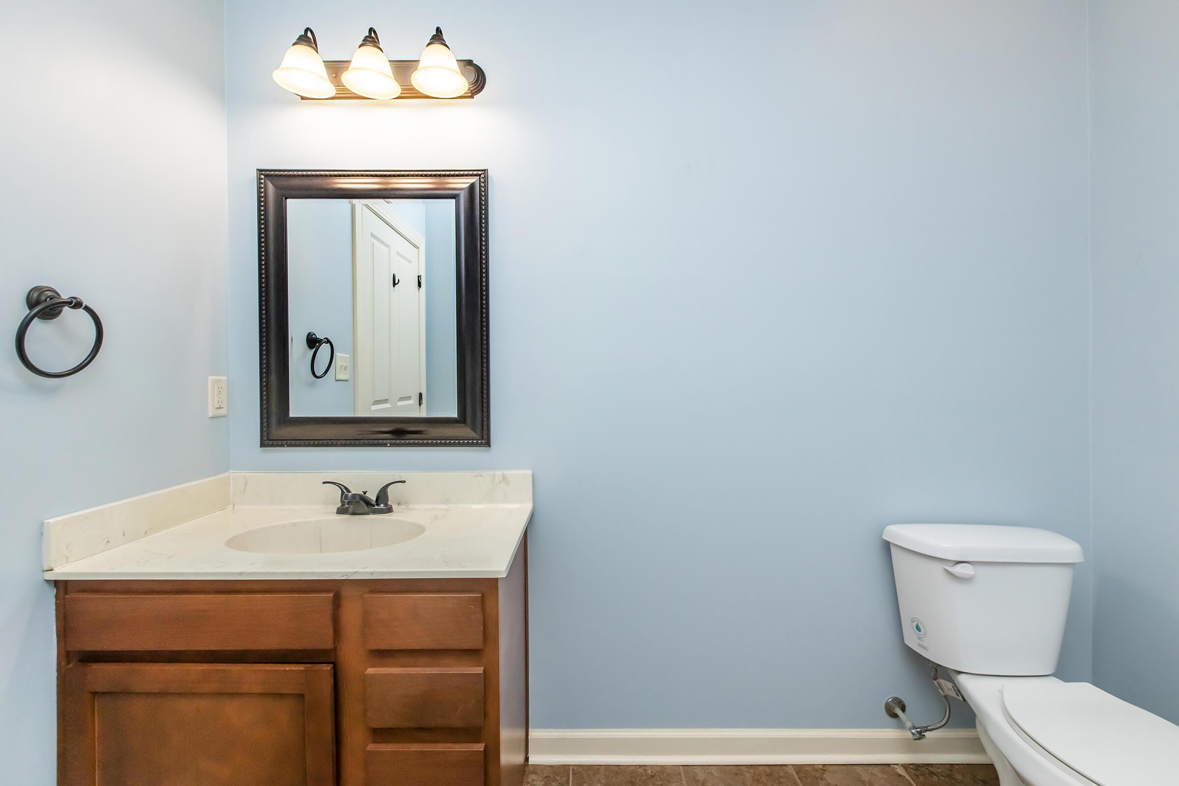 single sink and custom cabinetry at Stonewater Place Apartments