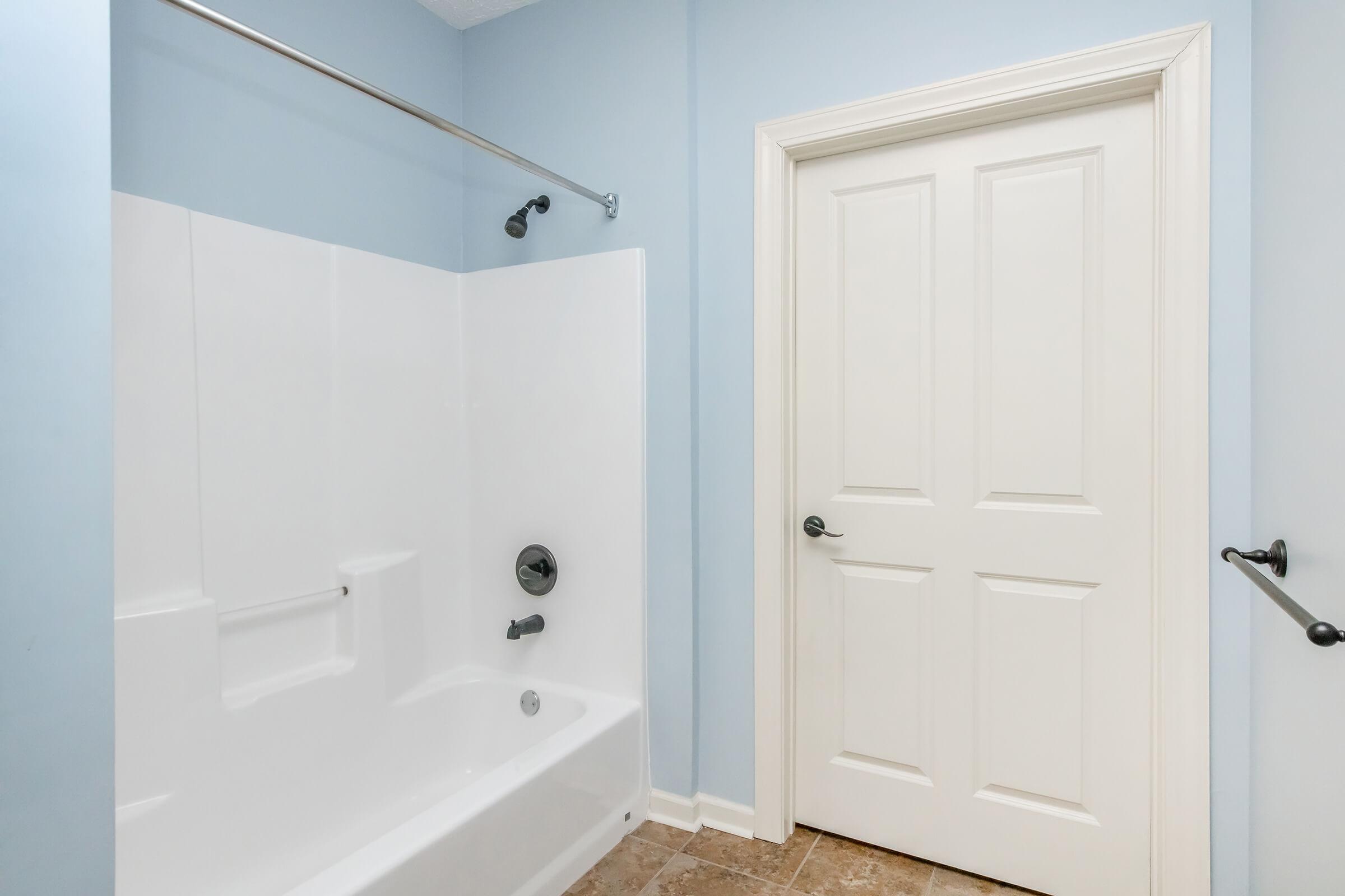 Tub and shower by private toilet area