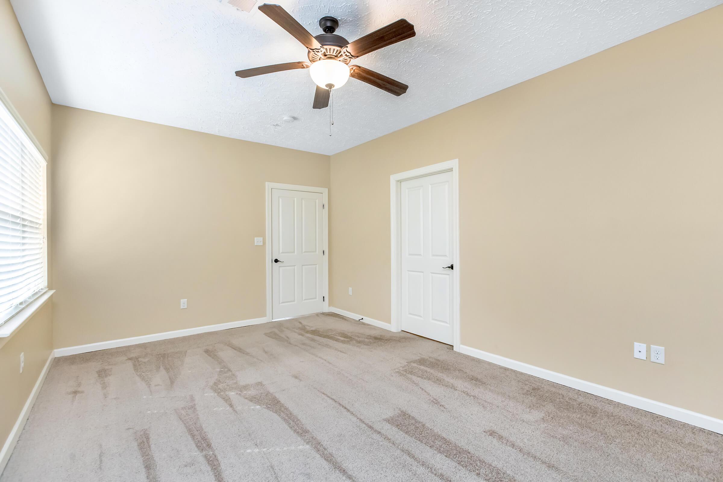 View of main entry and bathroom doors