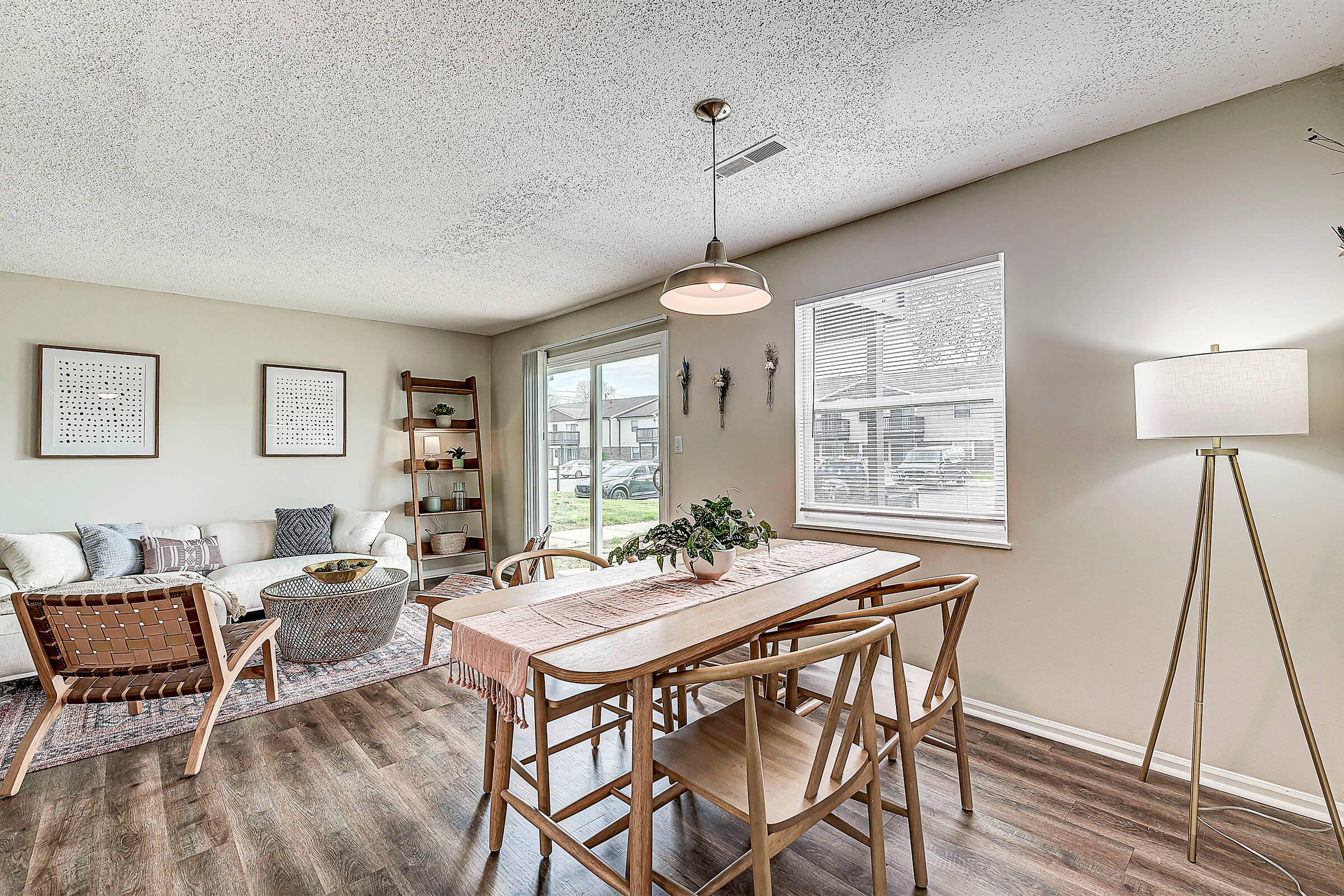 a living room filled with lots of furniture