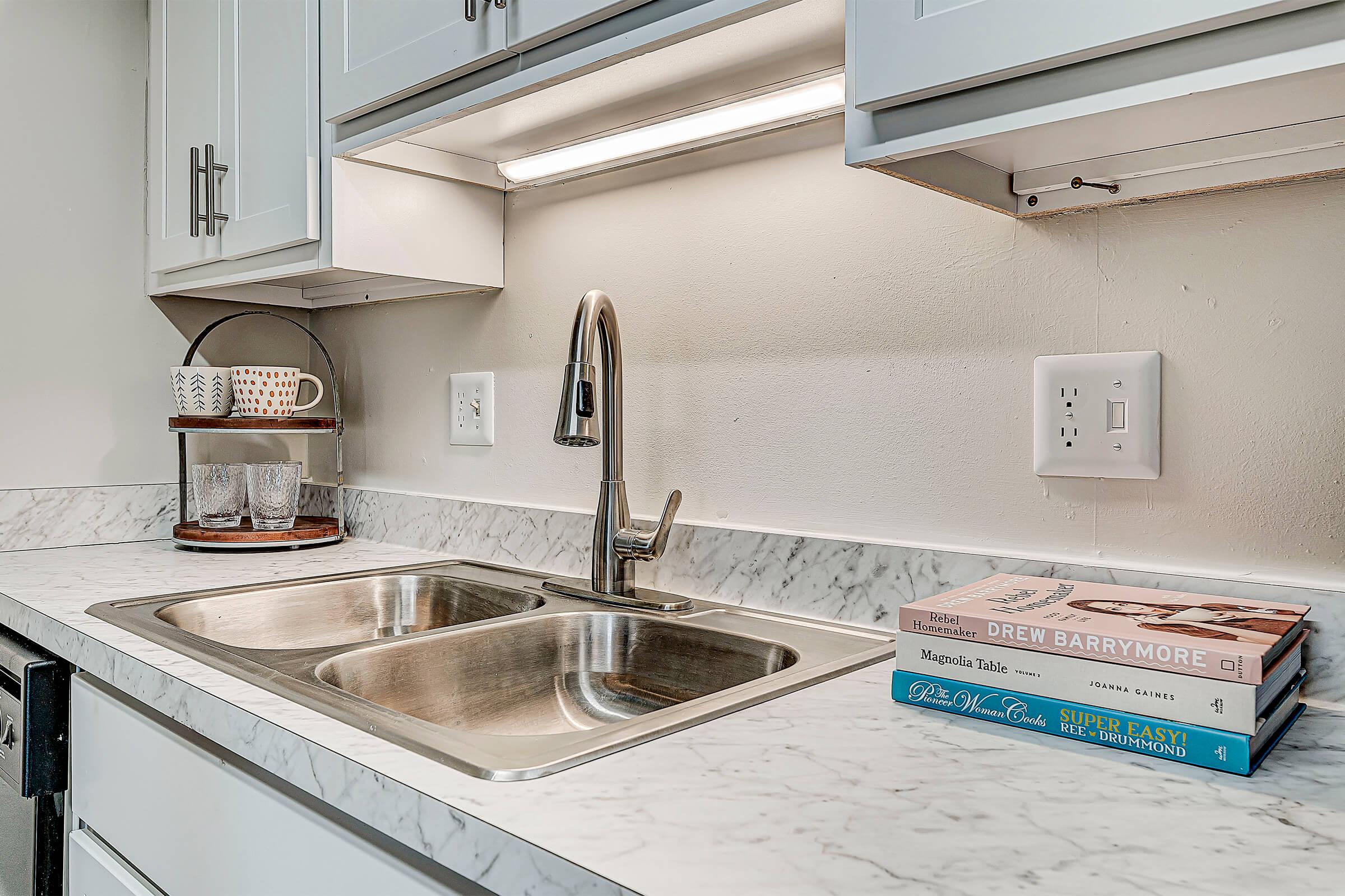 a counter top next to a sink