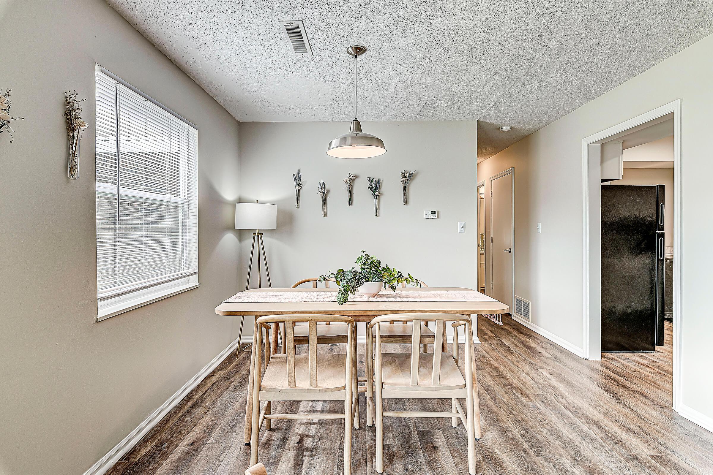 a room filled with furniture and a table