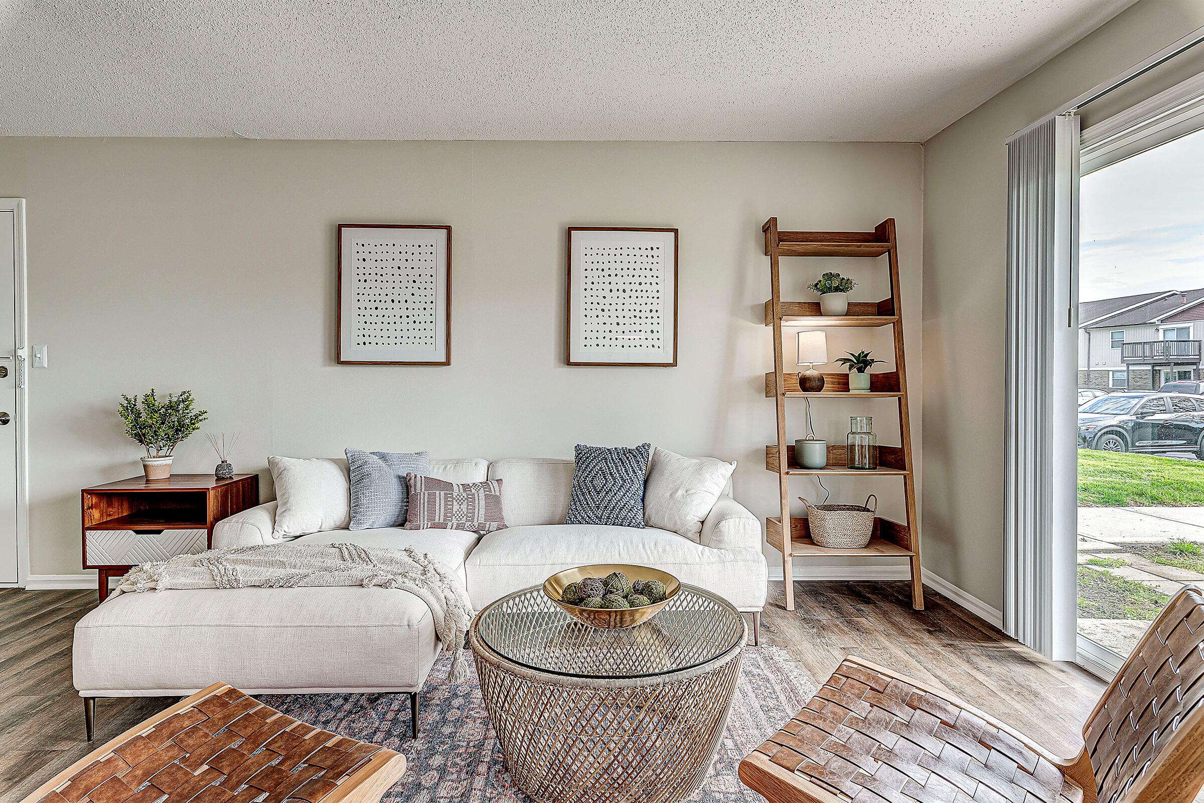 a room filled with furniture and a fireplace