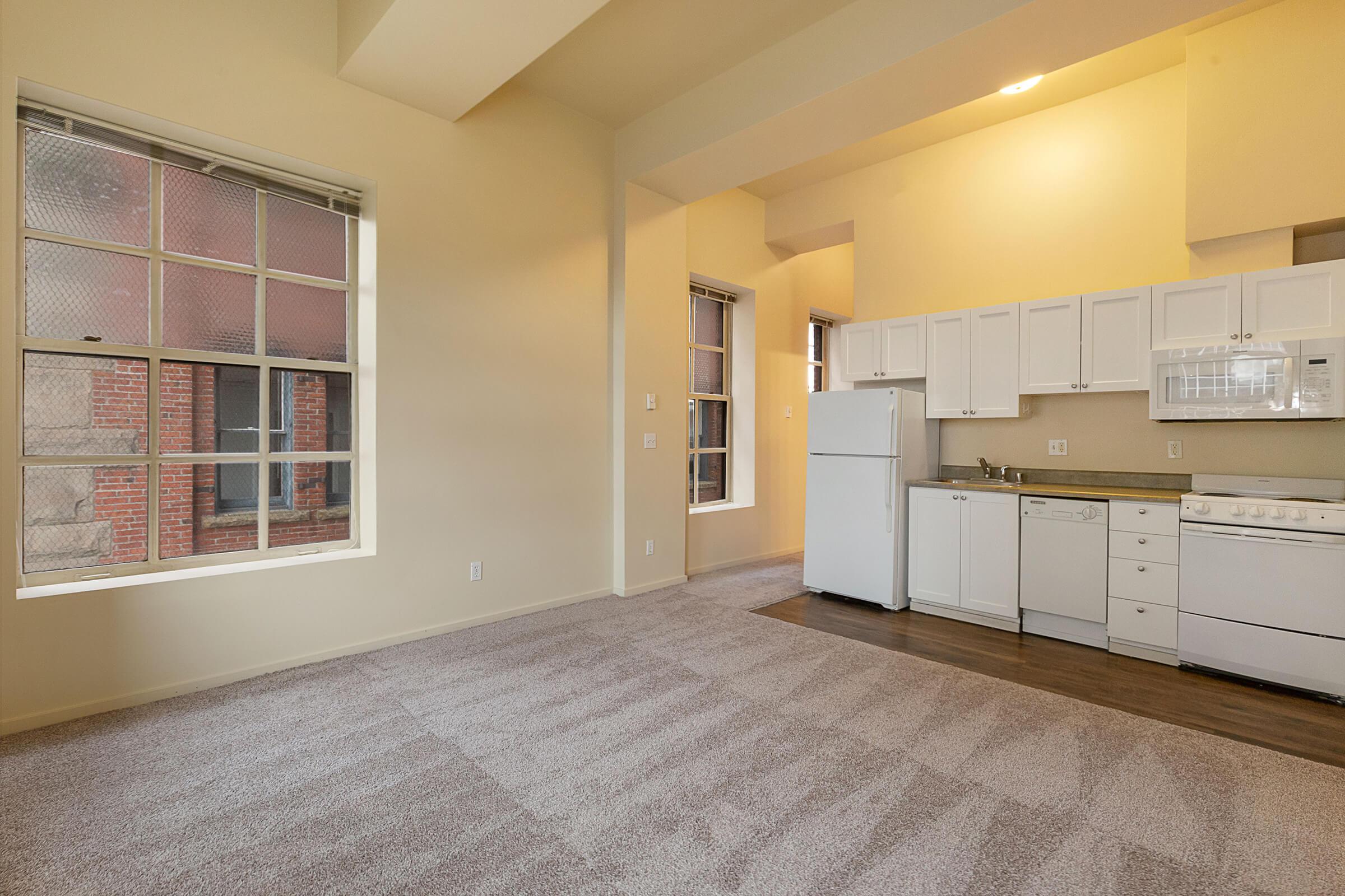 a kitchen with a tile floor