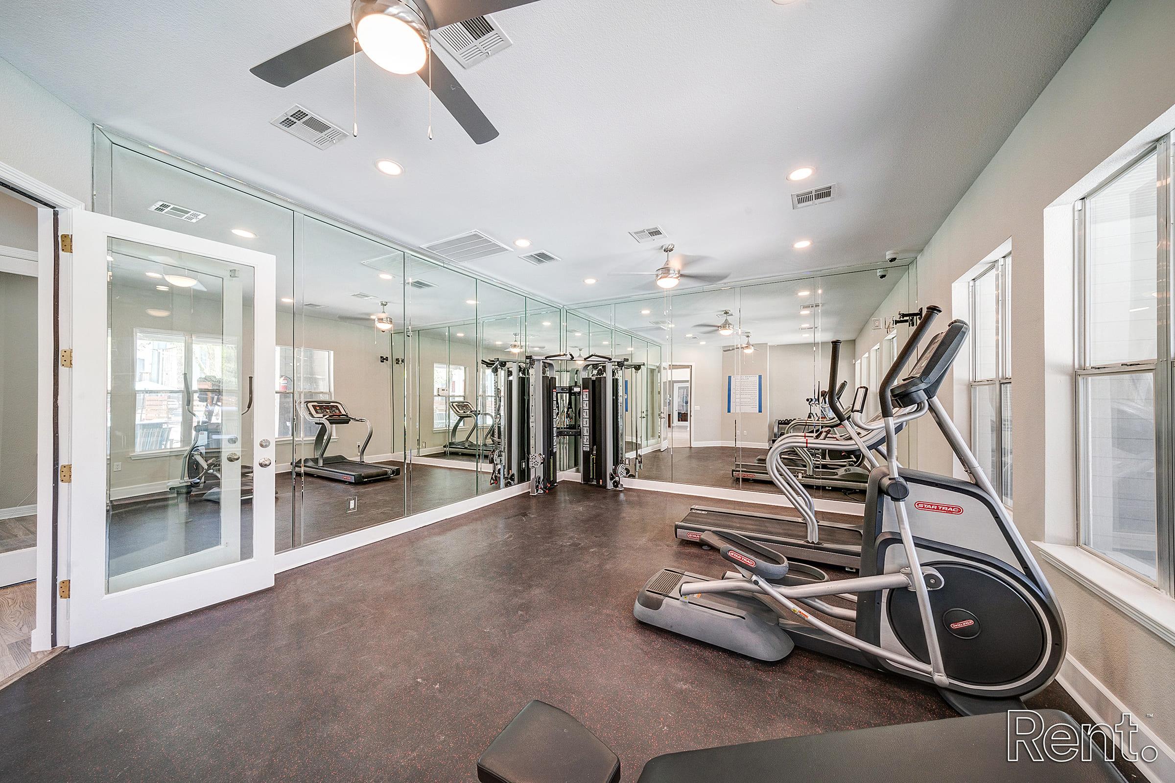 a room filled with furniture and a large window