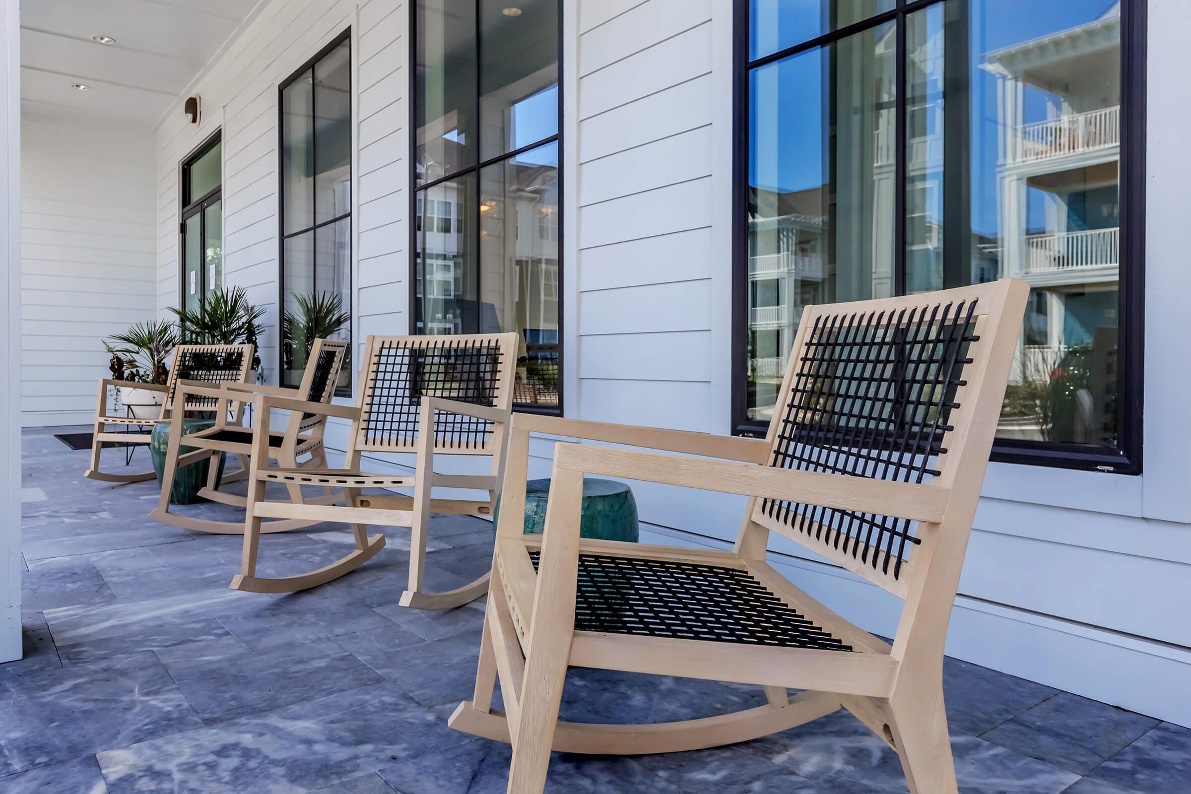 a chair sitting in front of a building