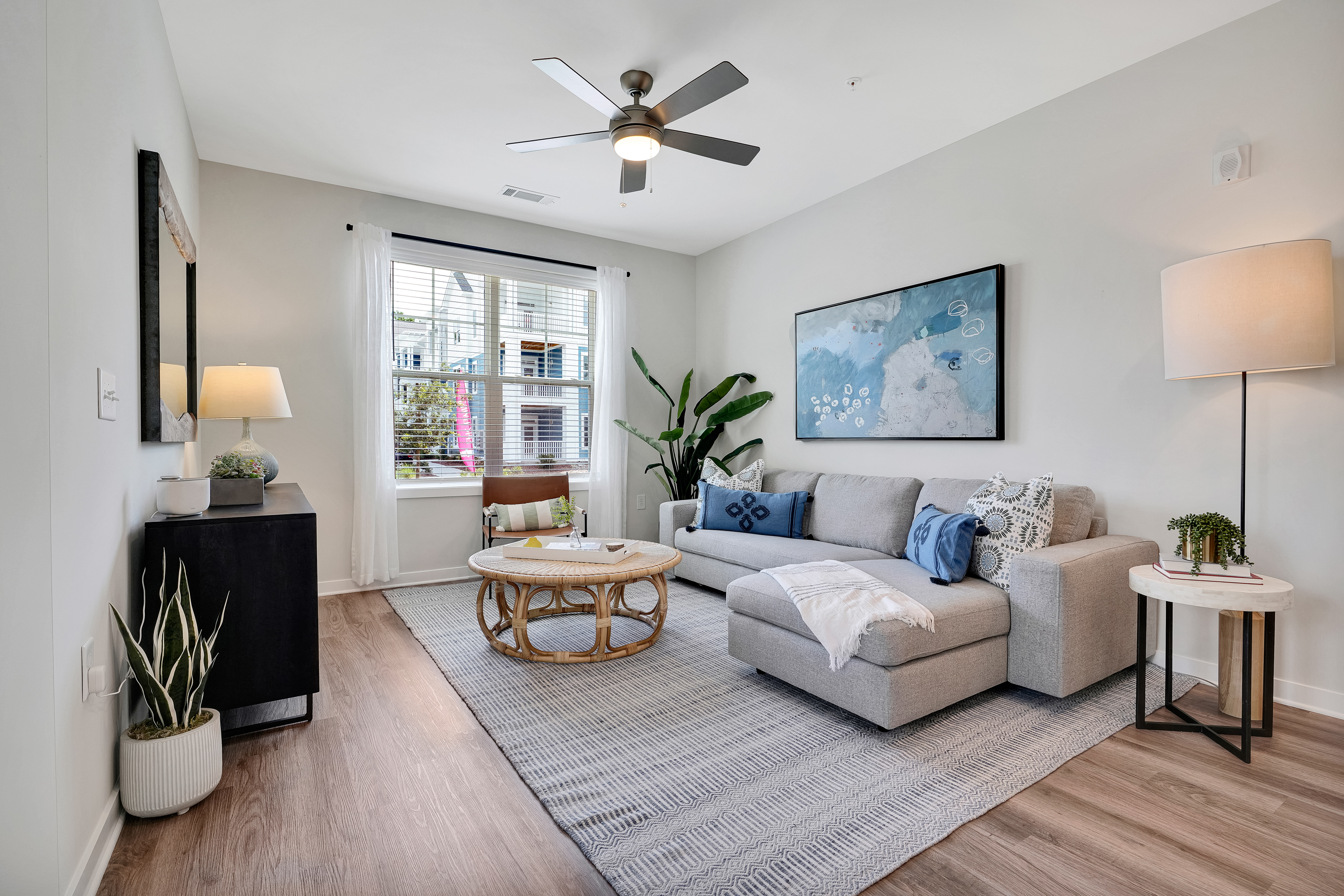 a living room filled with furniture and a fireplace