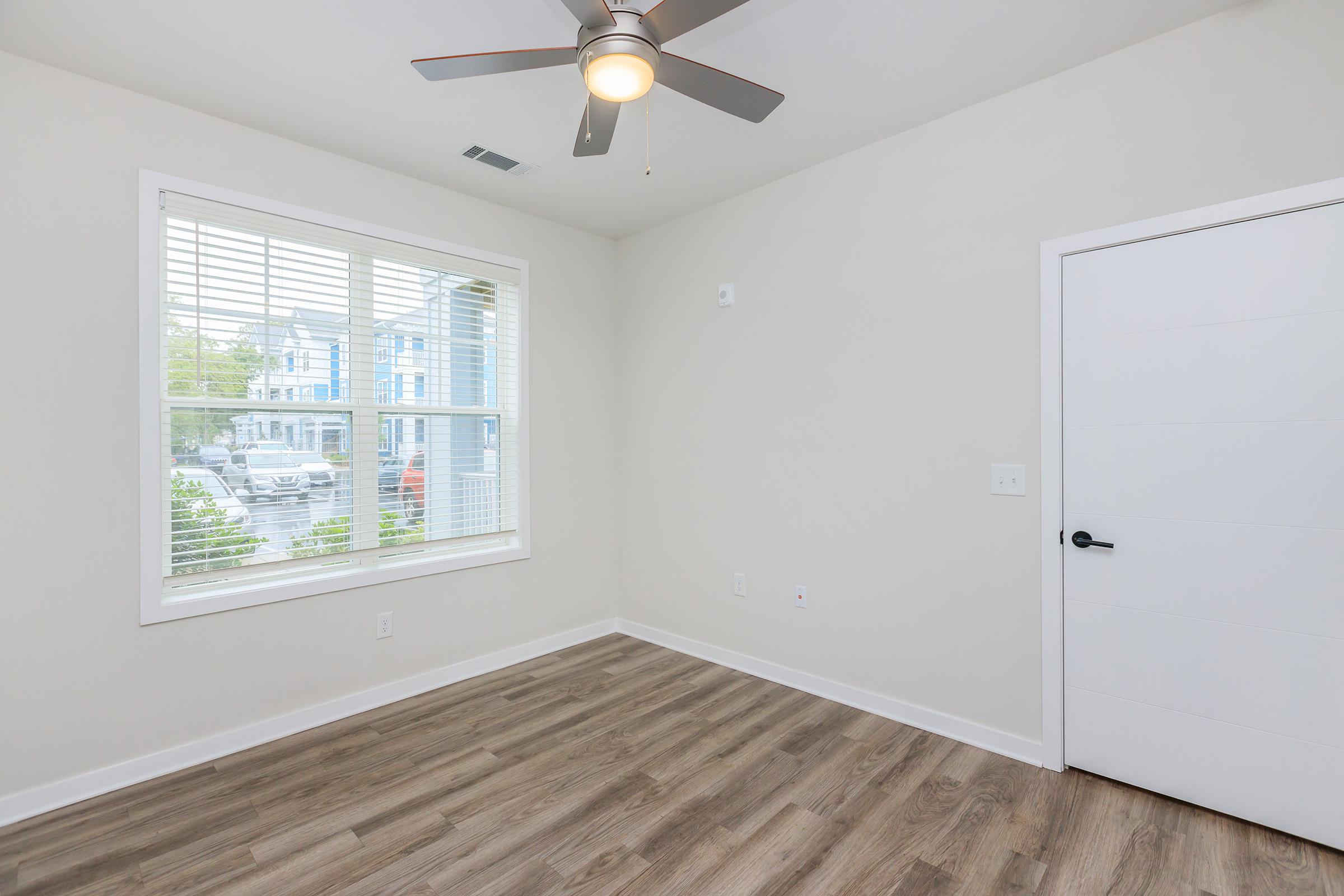 a room with a sink and a window