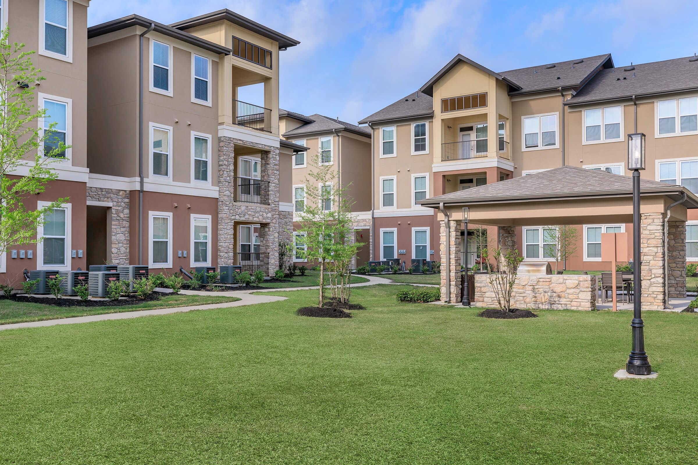 a large lawn in front of a house