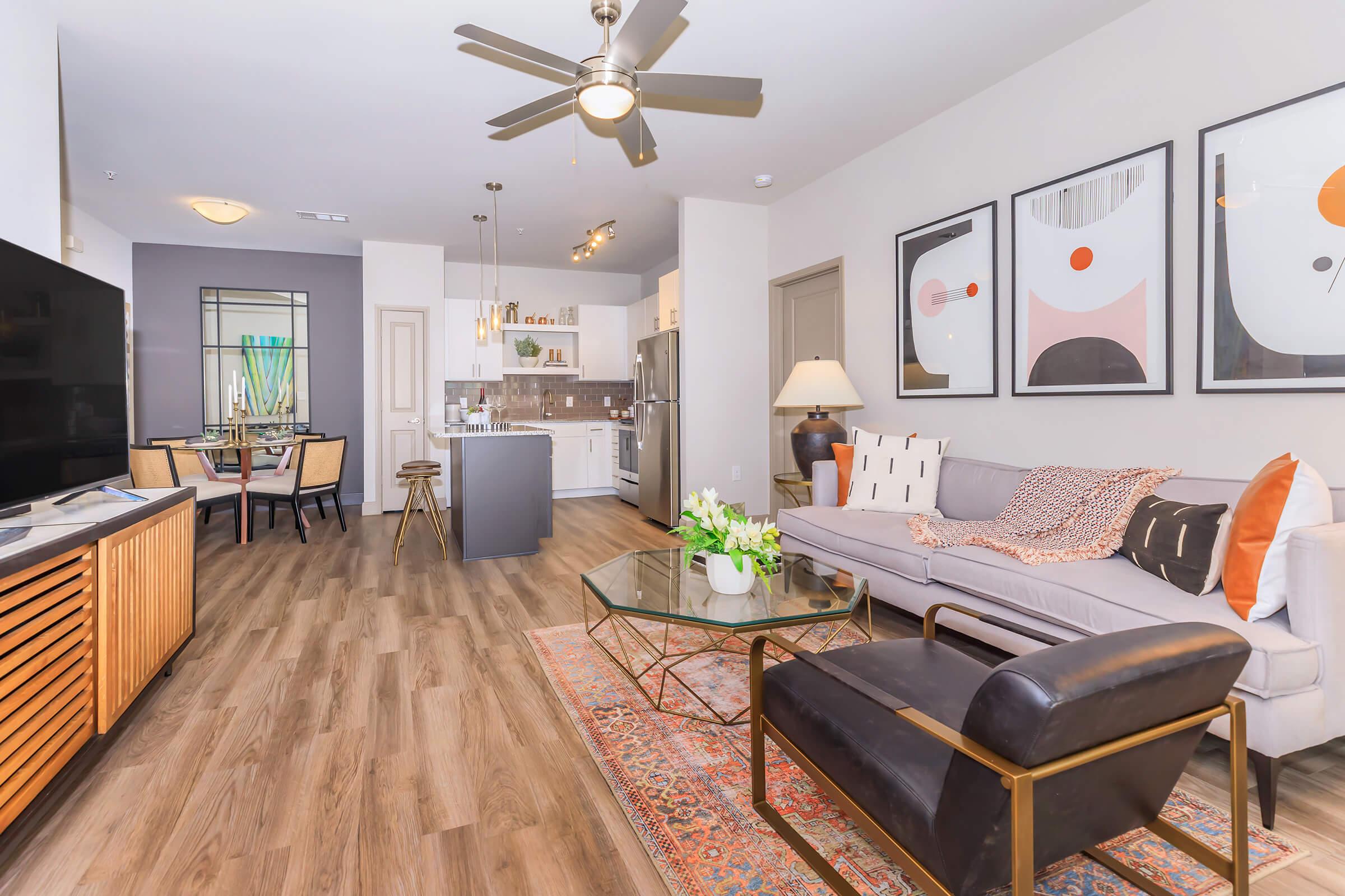 a living room filled with furniture and a fireplace