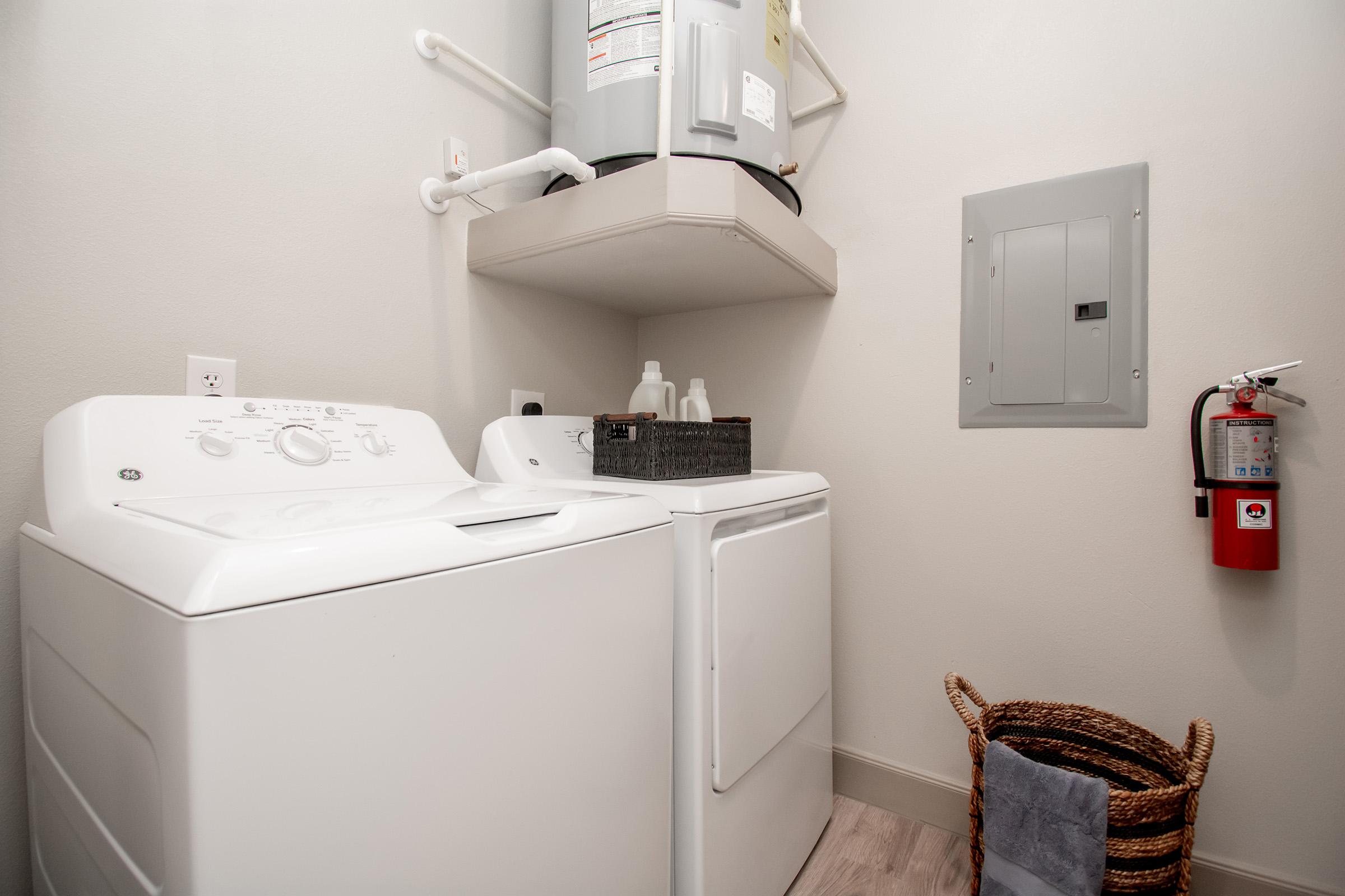 a kitchen with a sink and a refrigerator