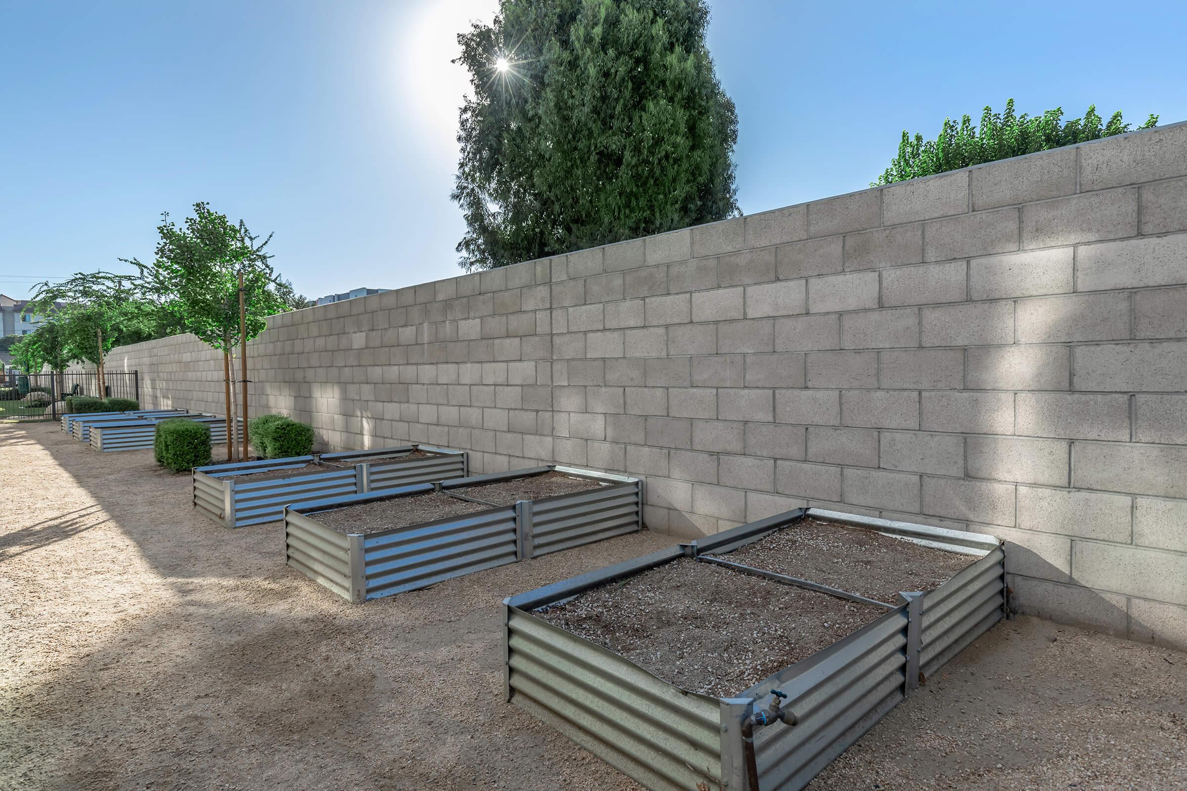 a bench in front of a brick building