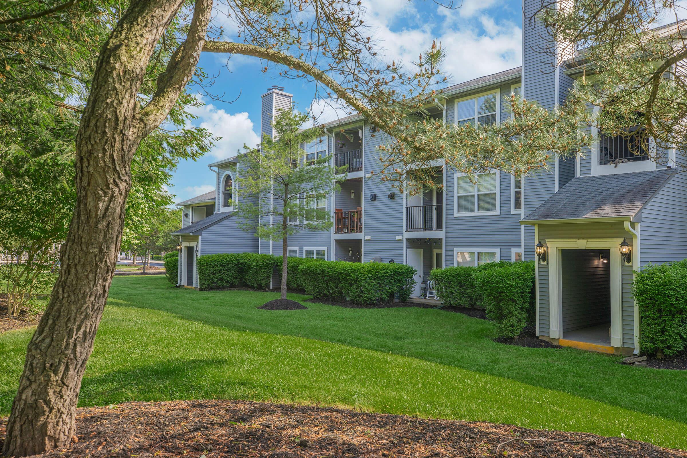 a large lawn in front of a house