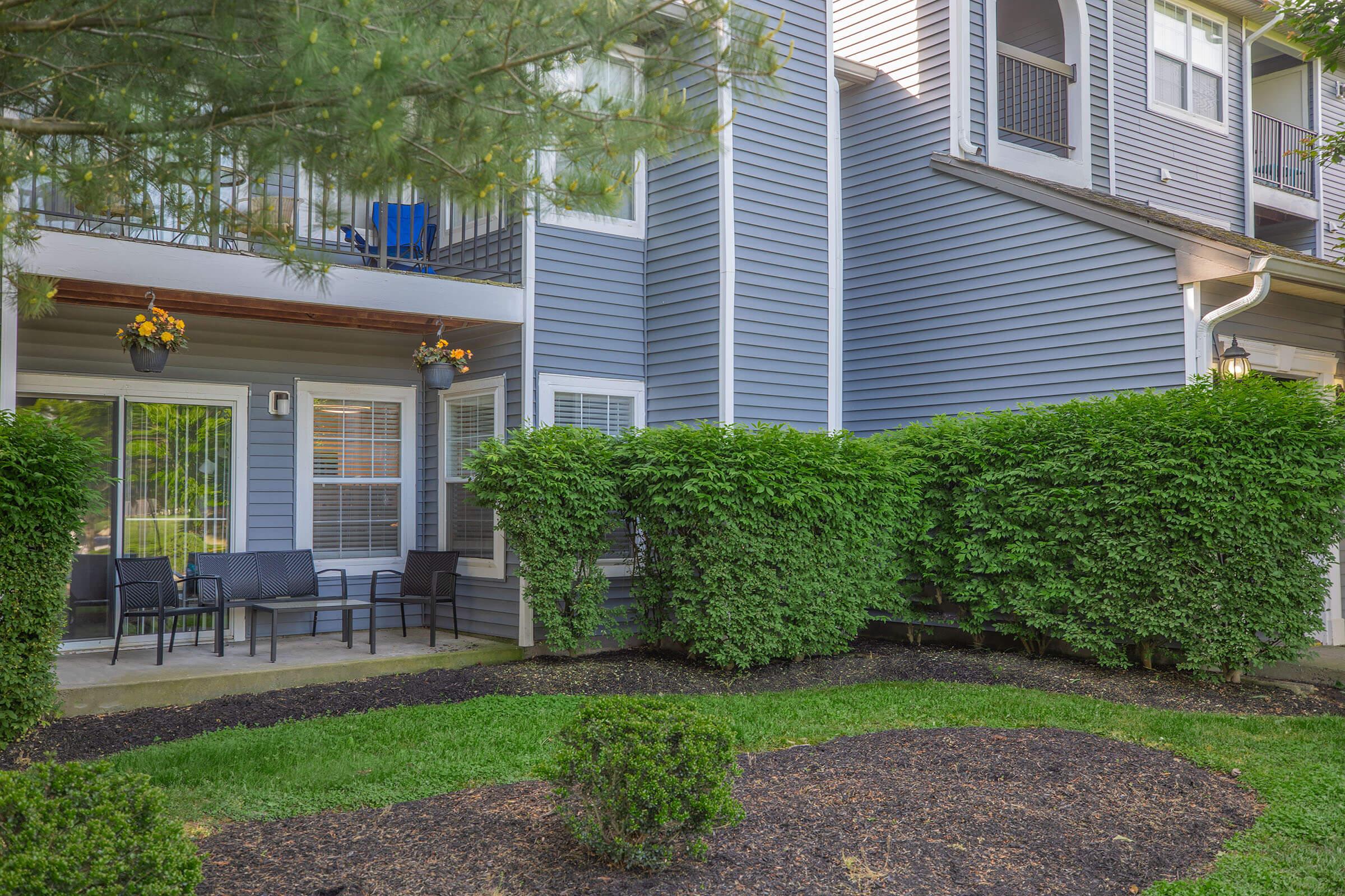 a garden in front of a building