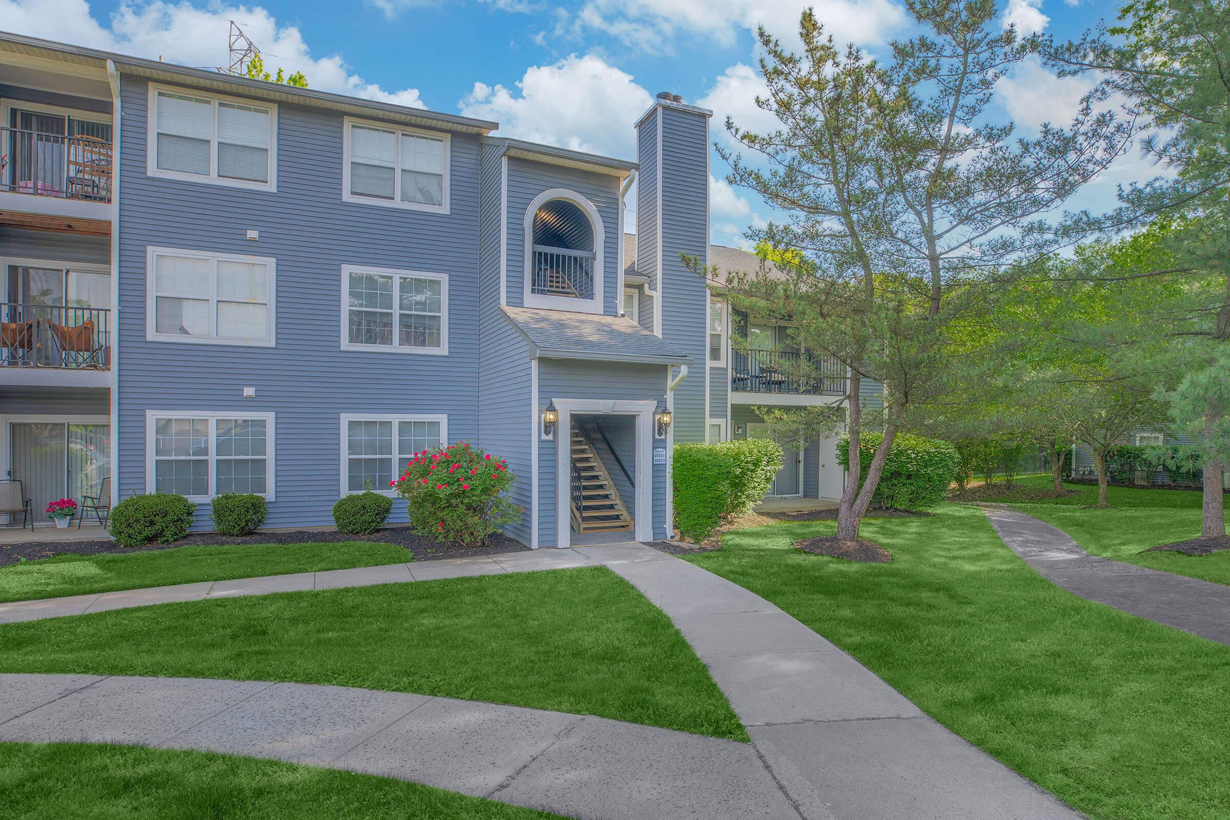 a large lawn in front of a building