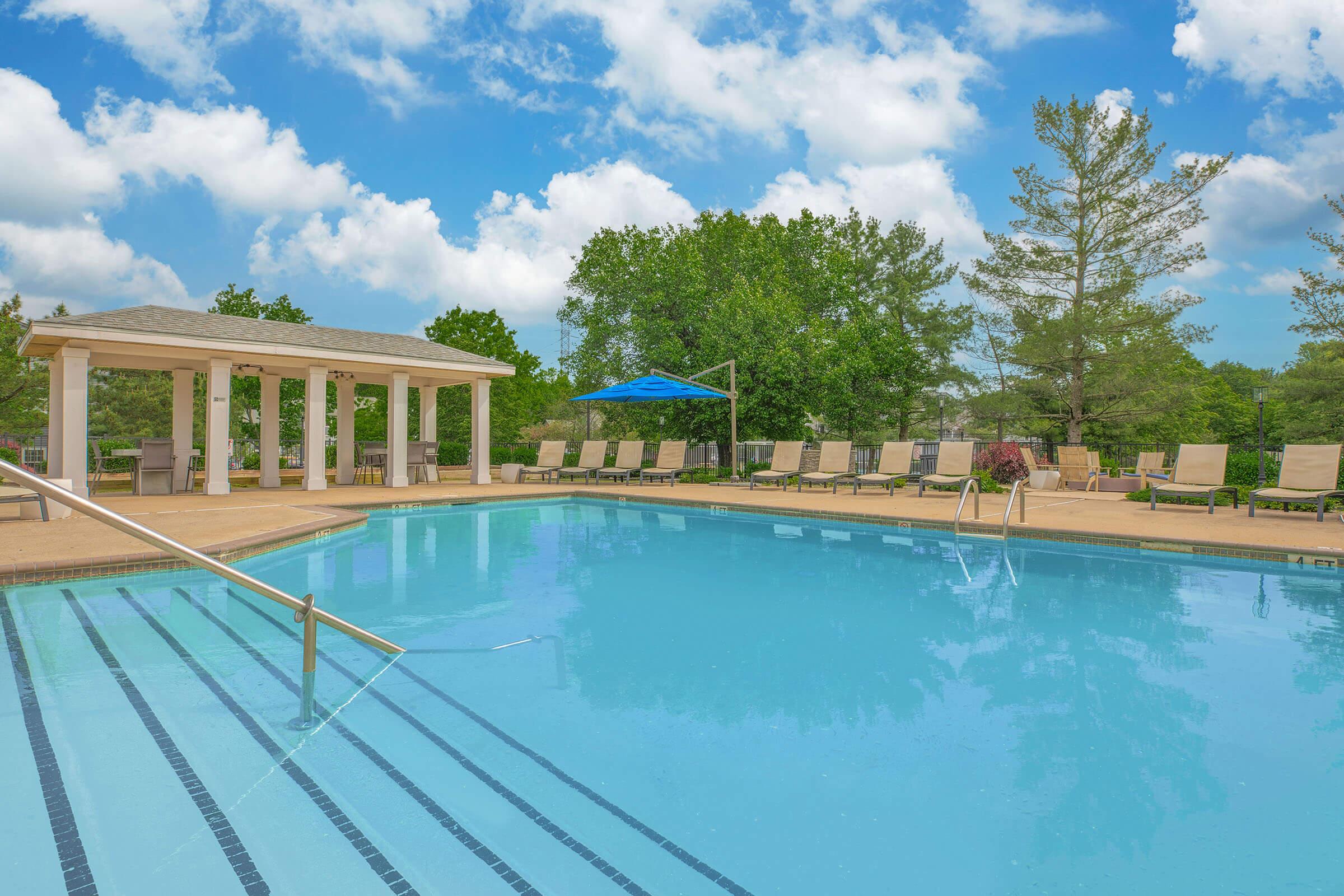 a pool next to a body of water