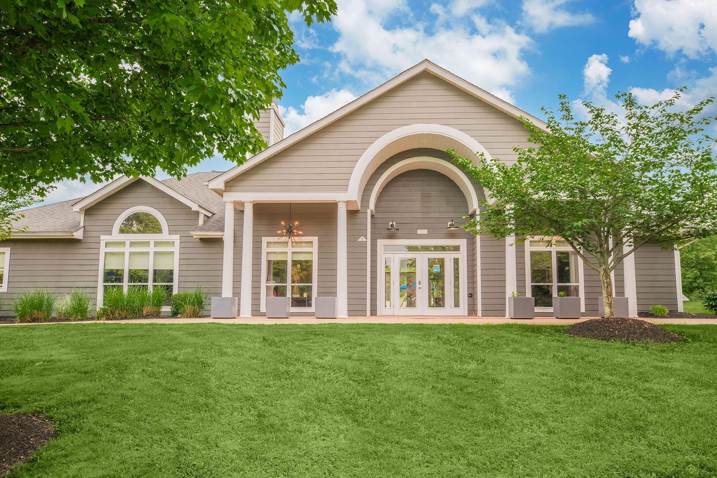 a large lawn in front of a house