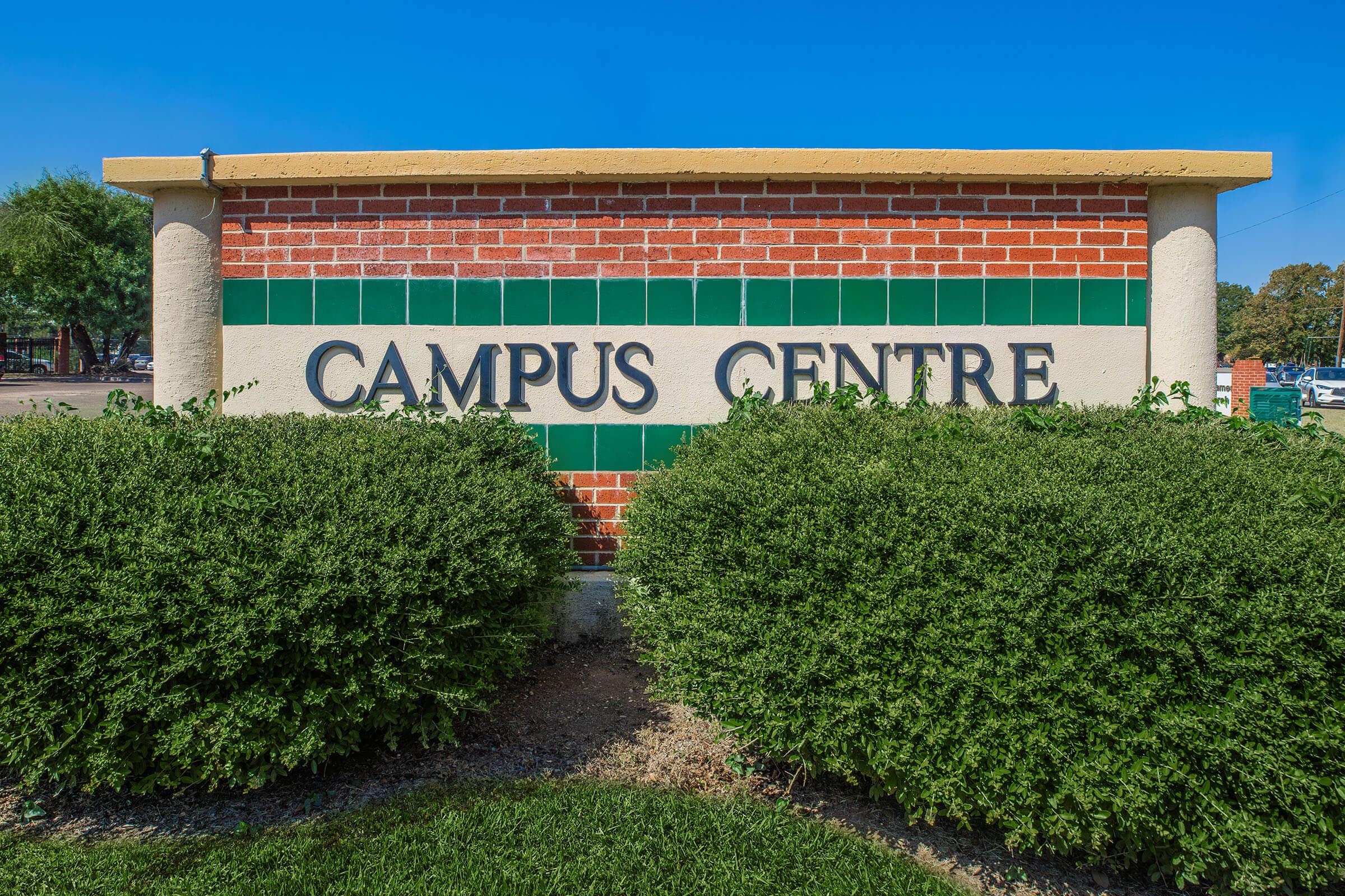 a sign in front of a building