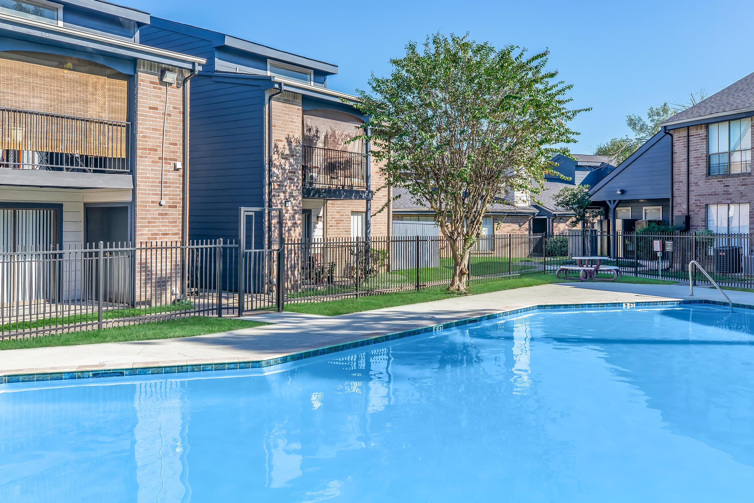 a house with a large pool of water