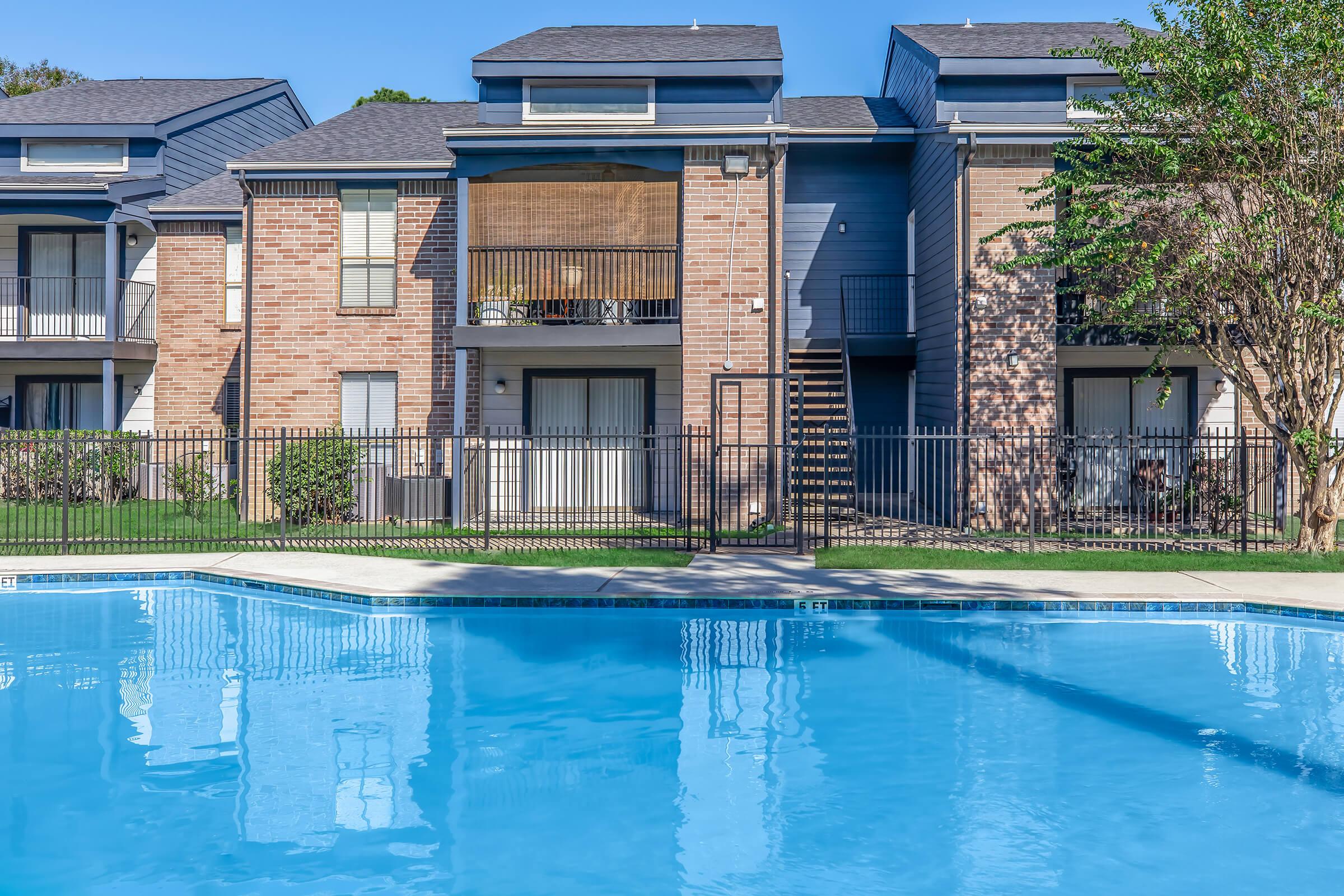 a house with a large pool of water