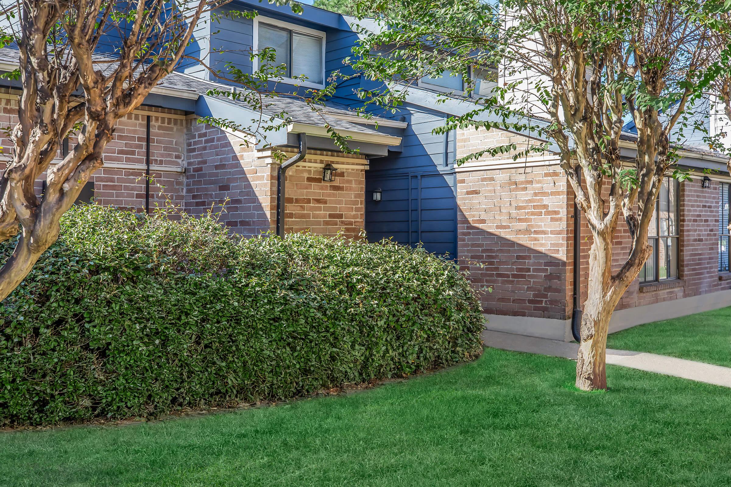 a large lawn in front of a house